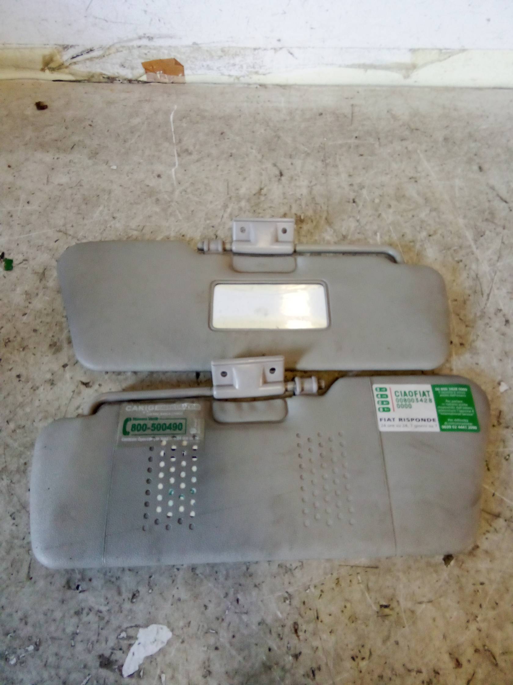 Aletta parasole parabrezza sx.