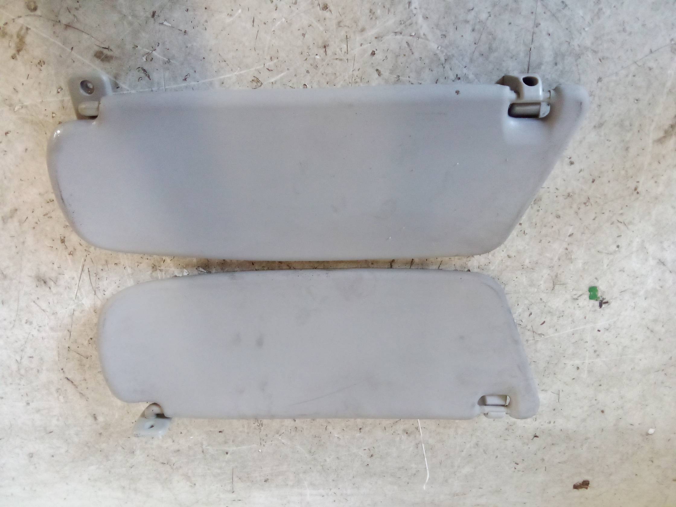 Aletta parasole parabrezza sx.