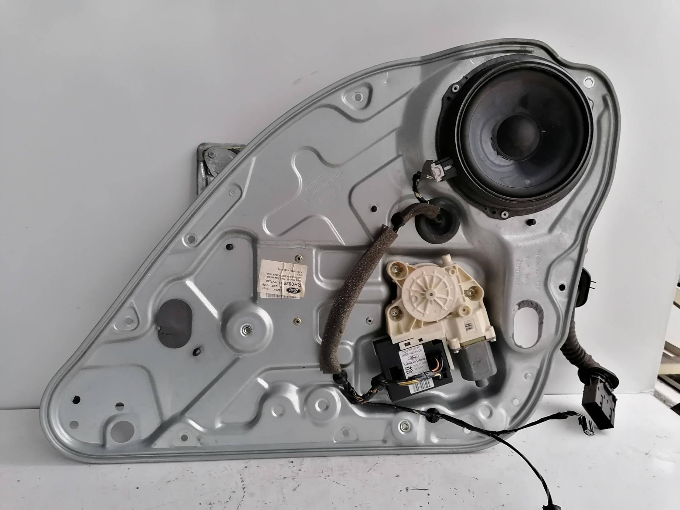 Alzacristallo elettr. porta post. dx.