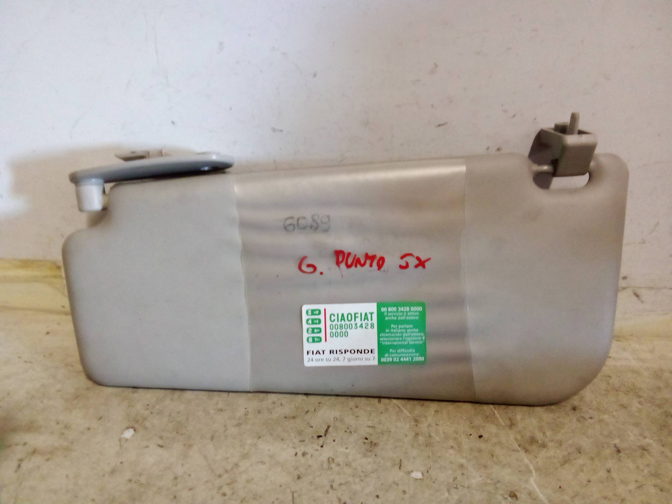 Aletta parasole parabrezza sx.