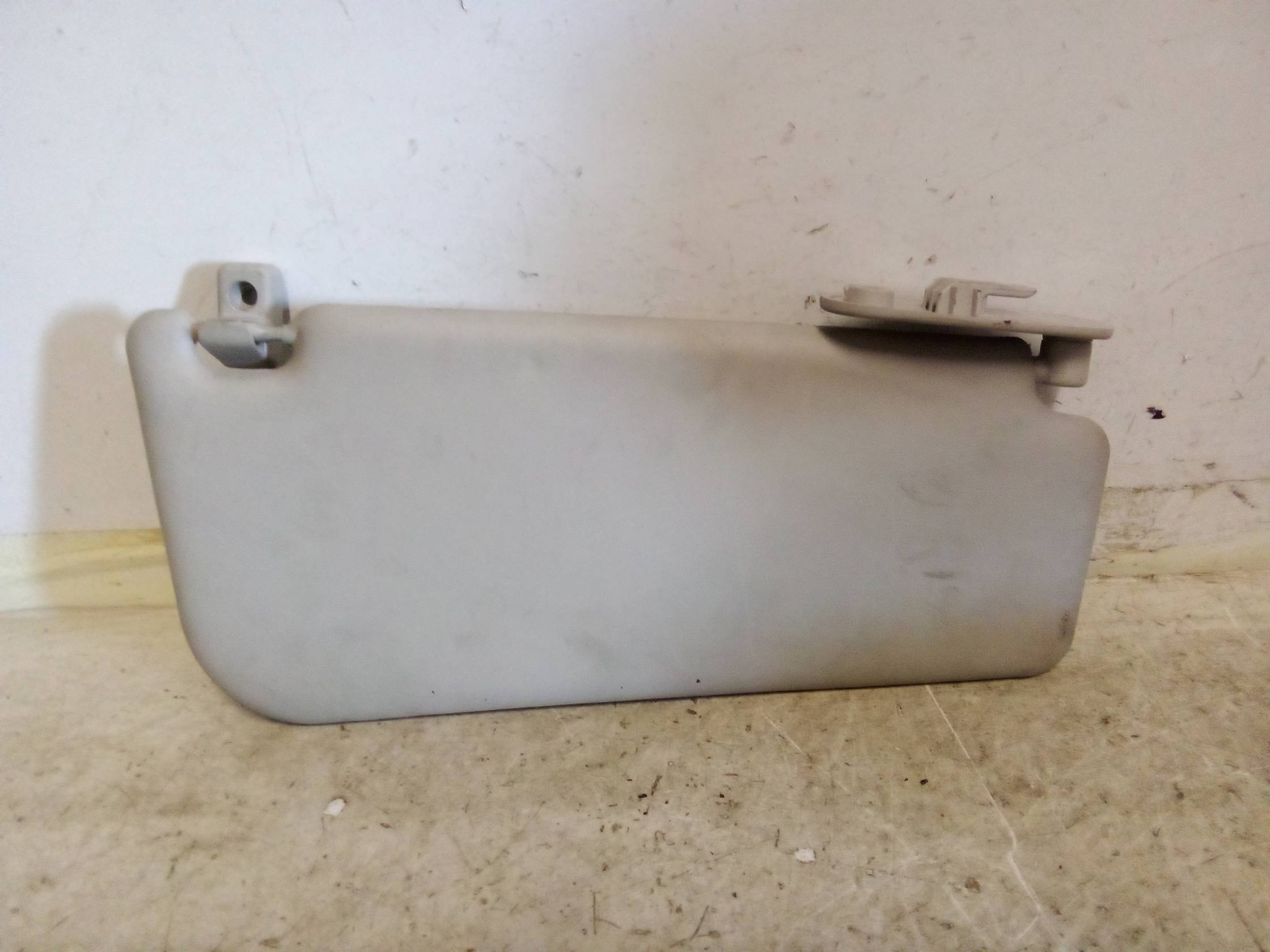 Aletta parasole parabrezza sx.