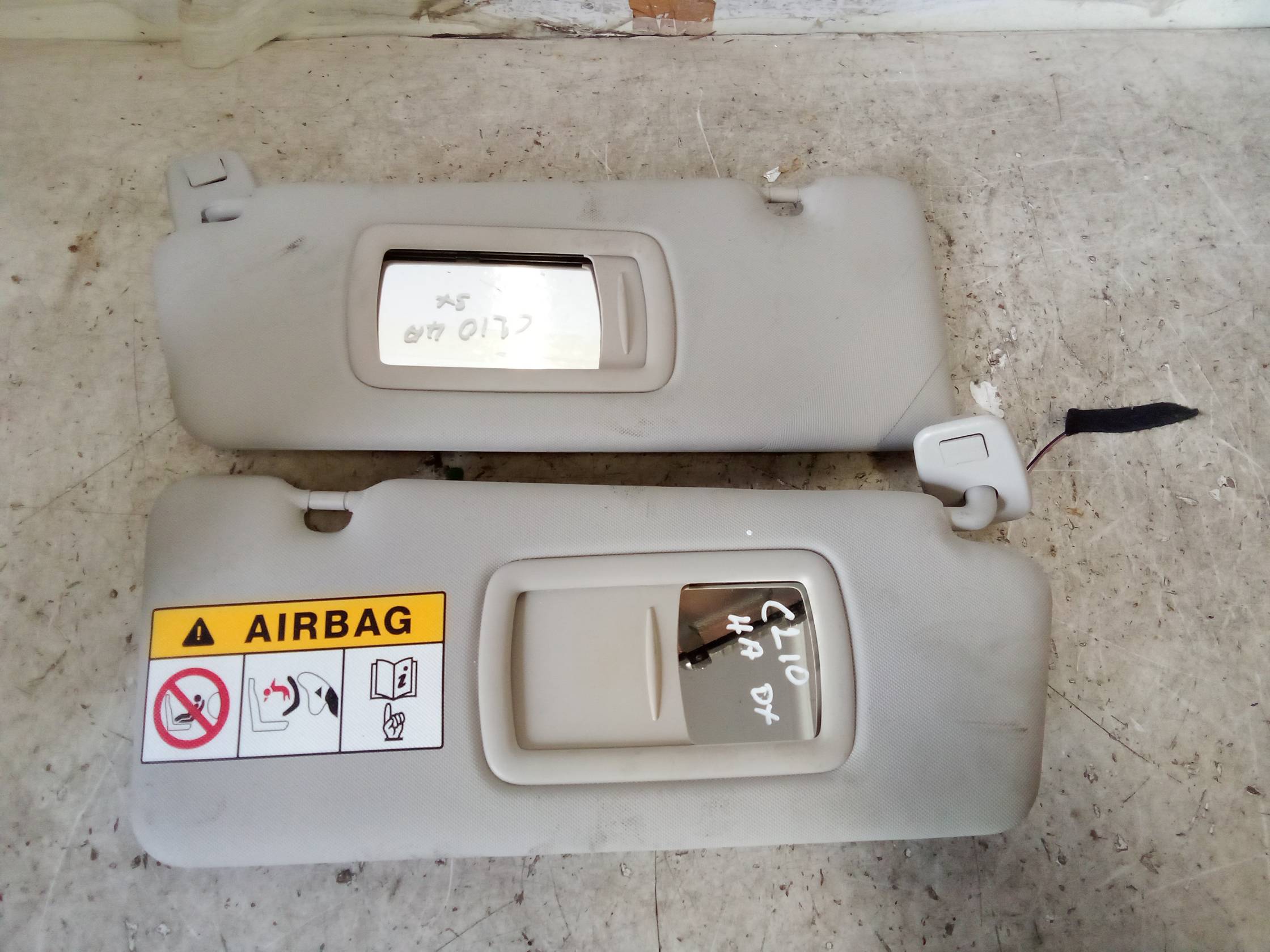 Aletta parasole parabrezza dx.