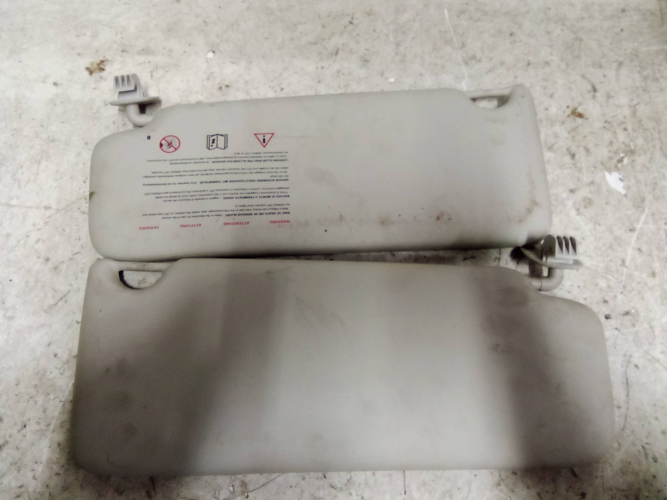 Aletta parasole parabrezza sx.