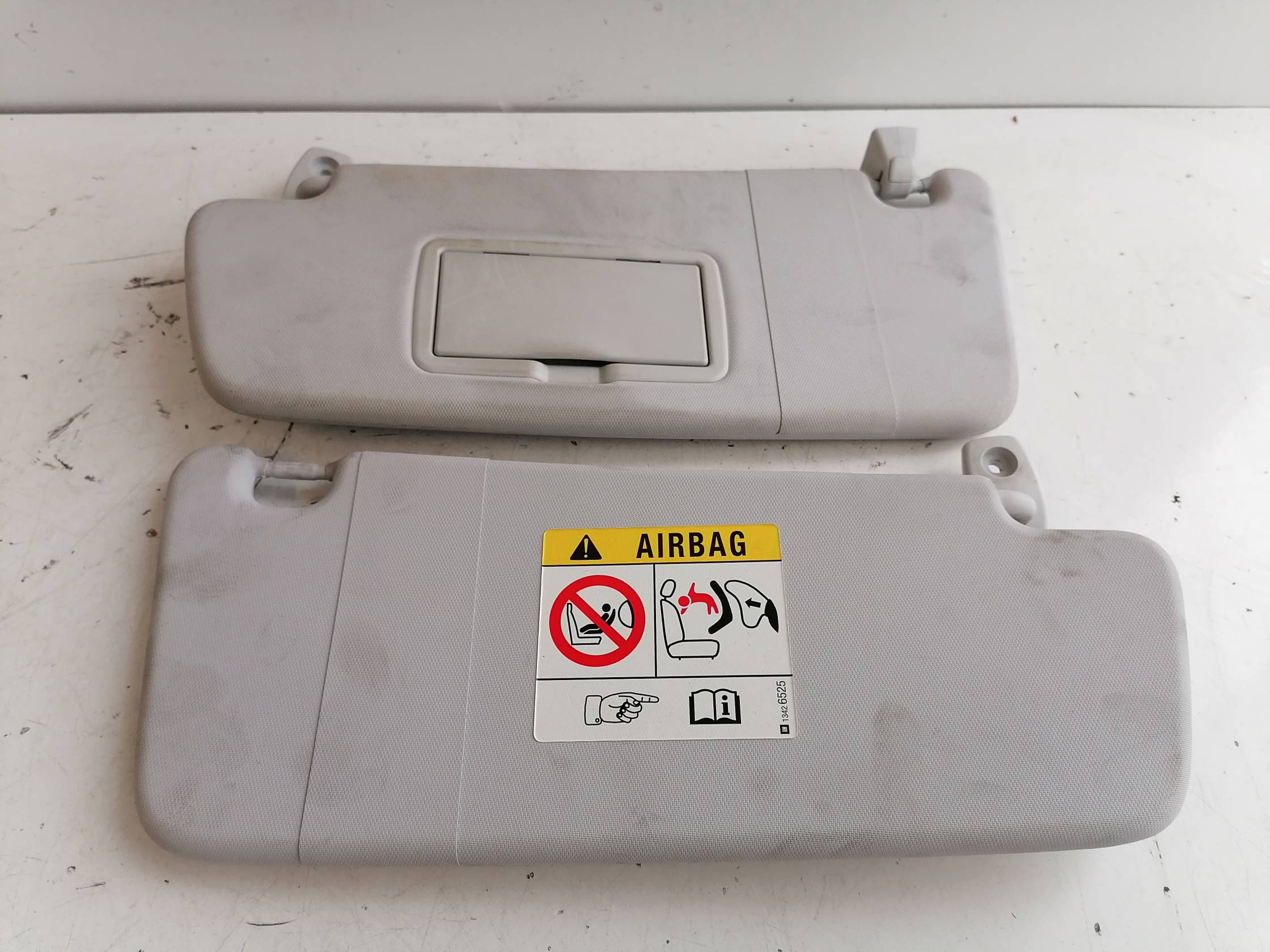 Aletta parasole parabrezza sx.