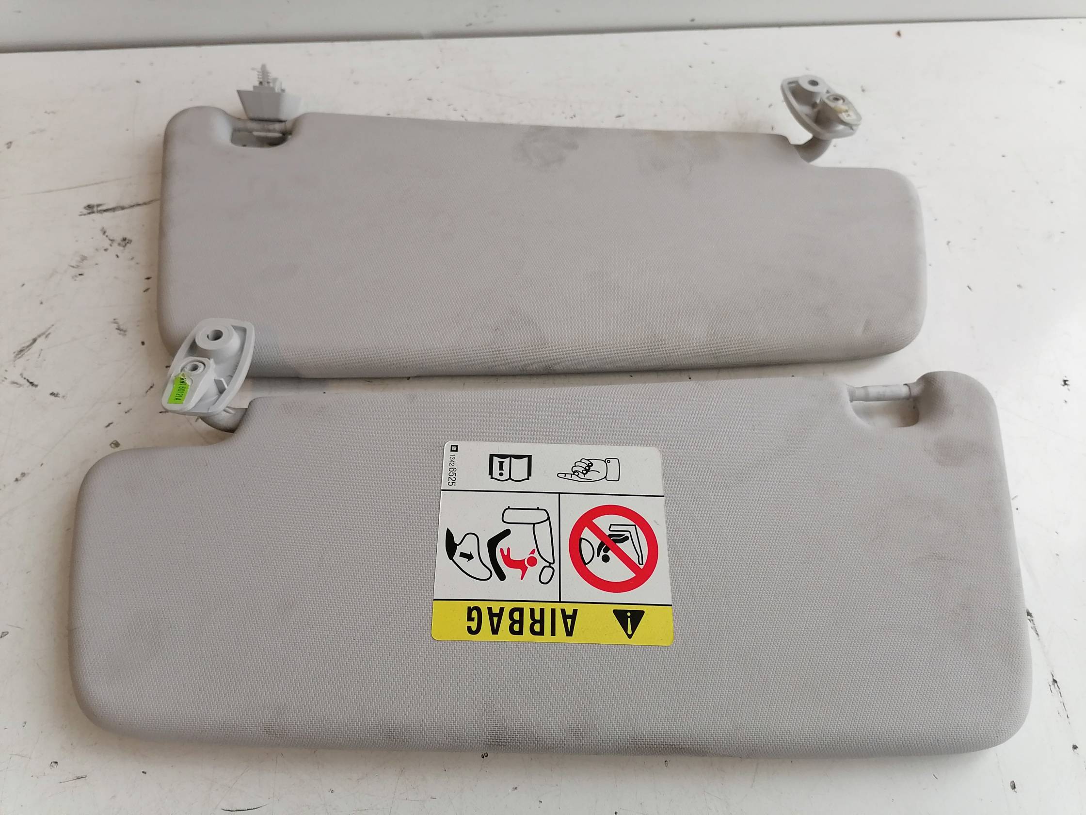 Aletta parasole parabrezza sx.