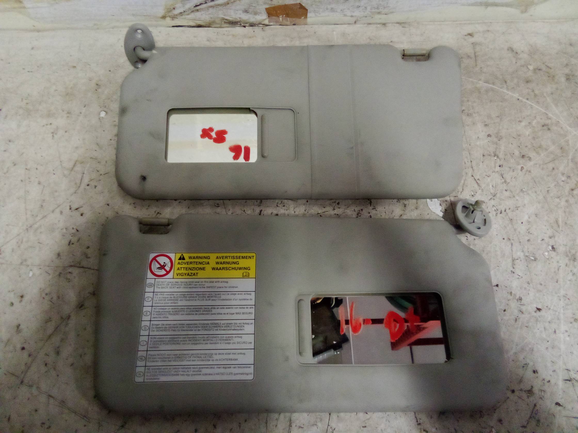 Aletta parasole parabrezza sx.