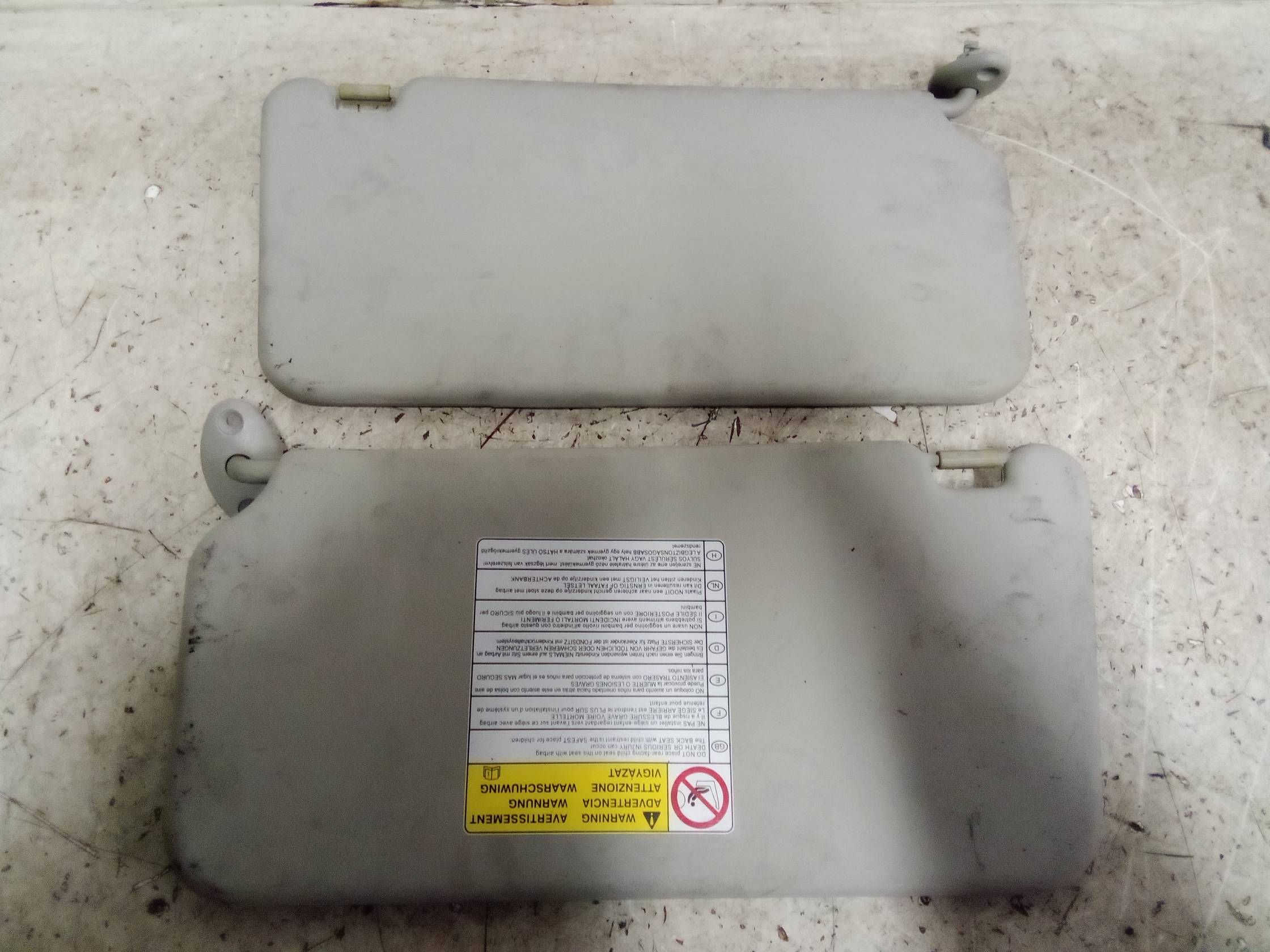 Aletta parasole parabrezza sx.