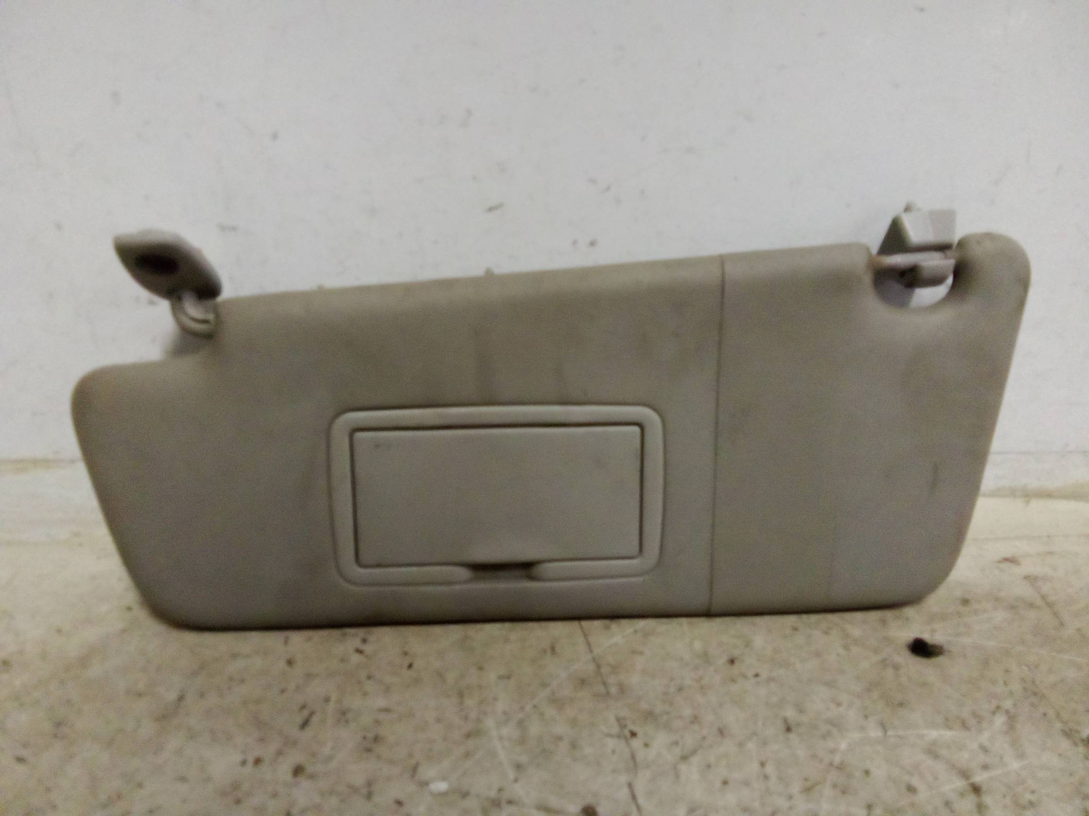 Aletta parasole parabrezza sx.