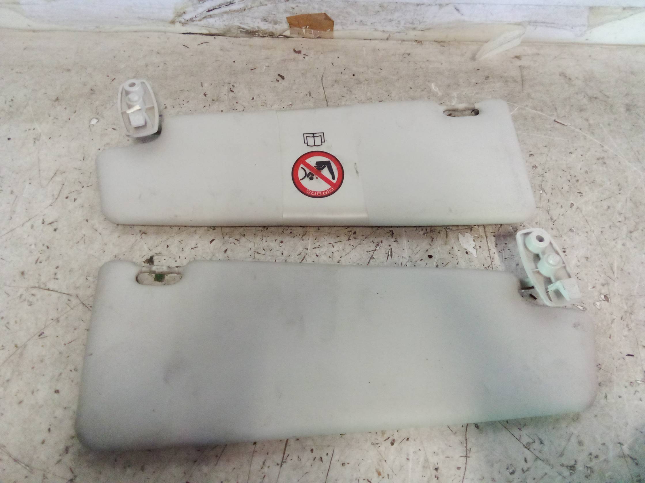 Aletta parasole parabrezza dx.