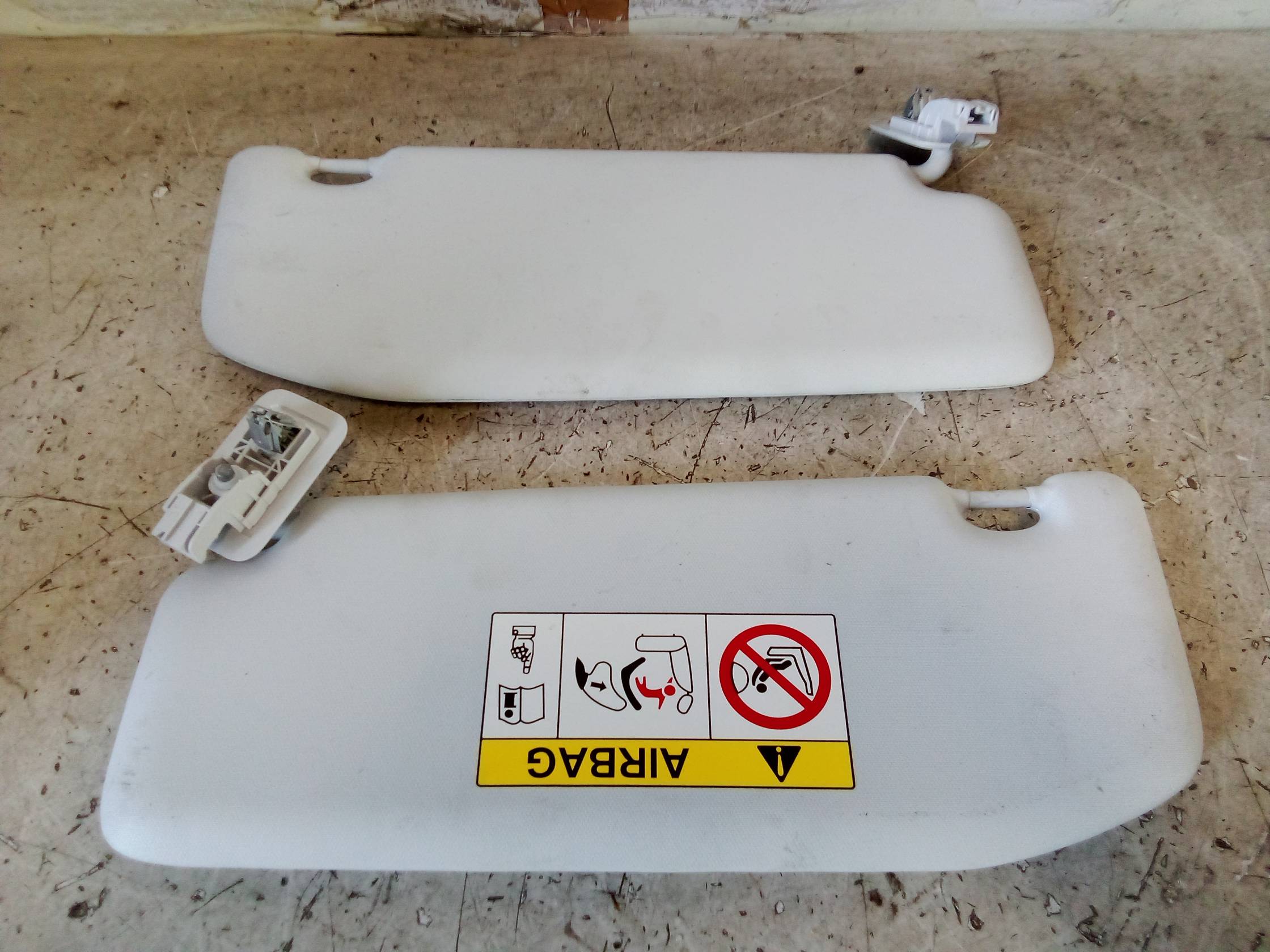 Aletta parasole parabrezza sx.