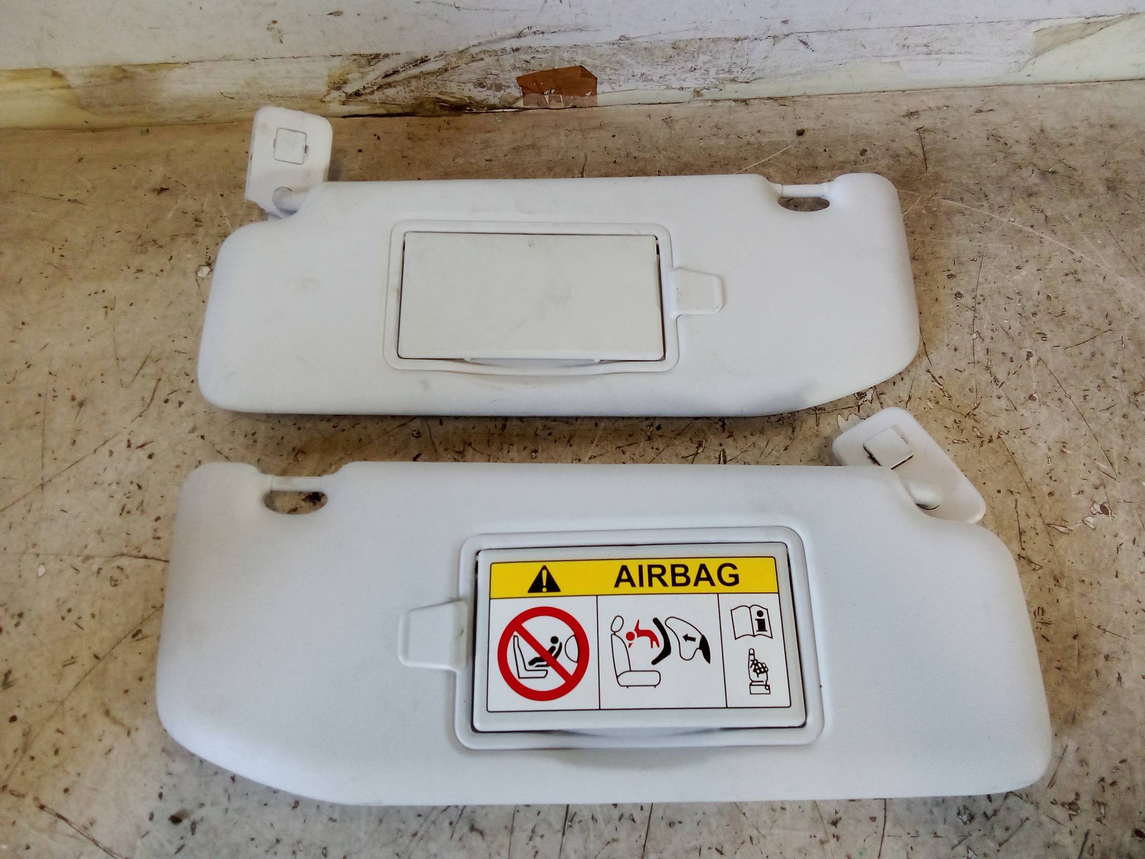 Aletta parasole parabrezza sx.