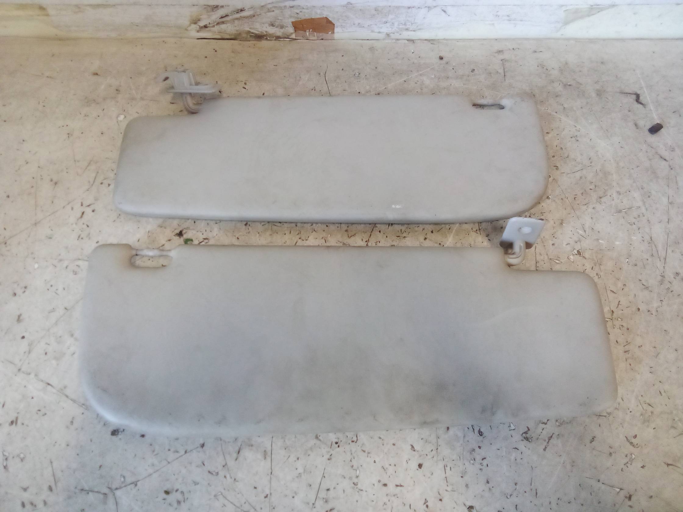 Aletta parasole parabrezza sx.