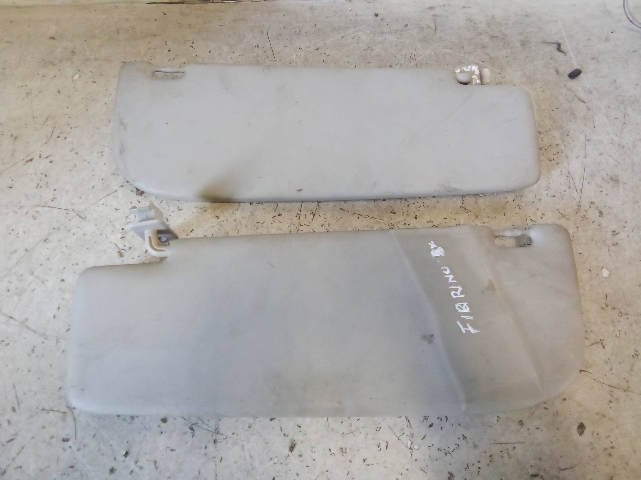 Aletta parasole parabrezza sx.