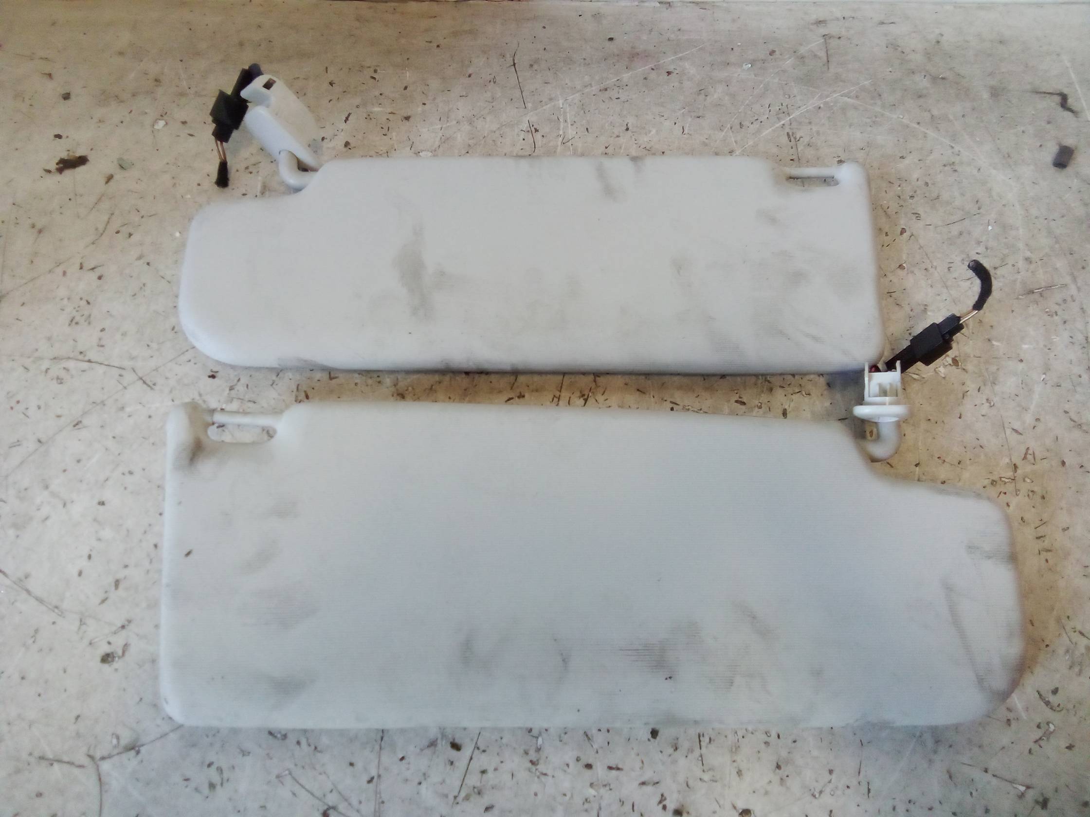 Aletta parasole parabrezza sx.