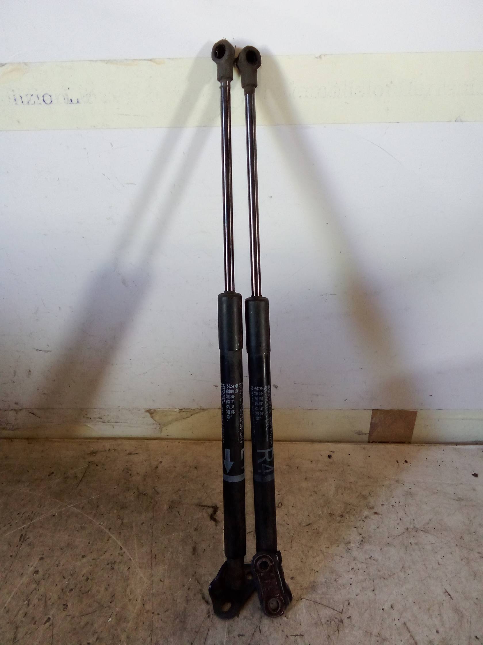 Asta ammortizzante portello post. sx.