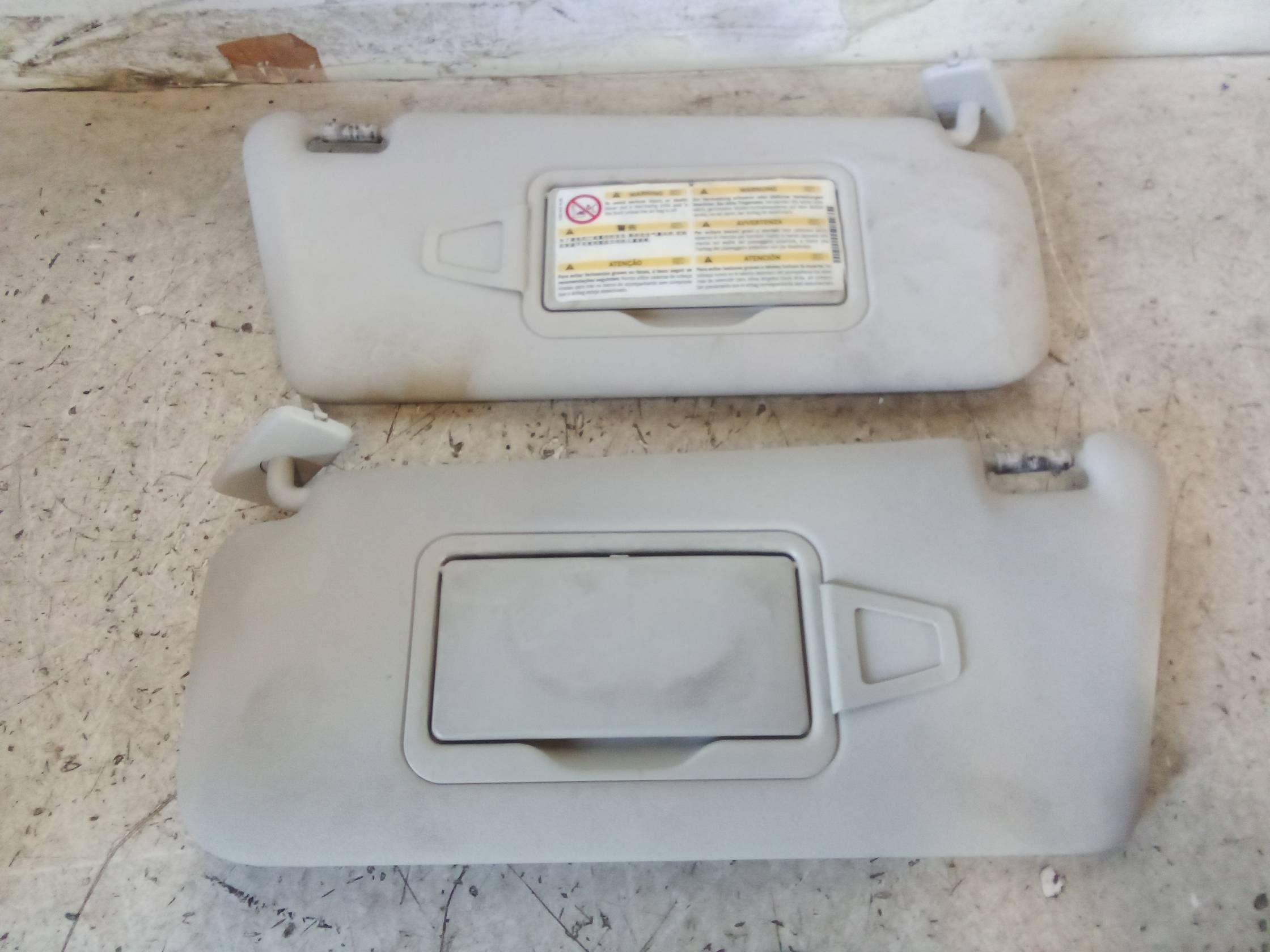 Aletta parasole parabrezza sx.