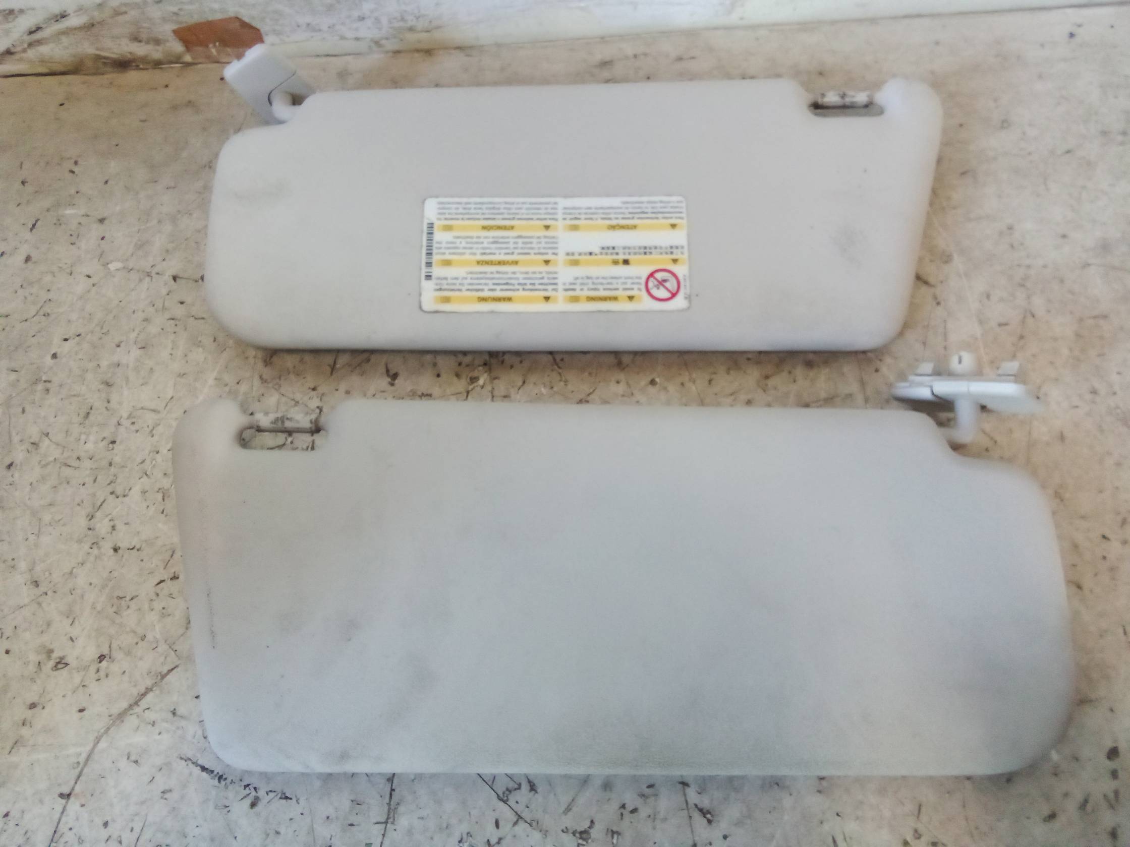 Aletta parasole parabrezza sx.