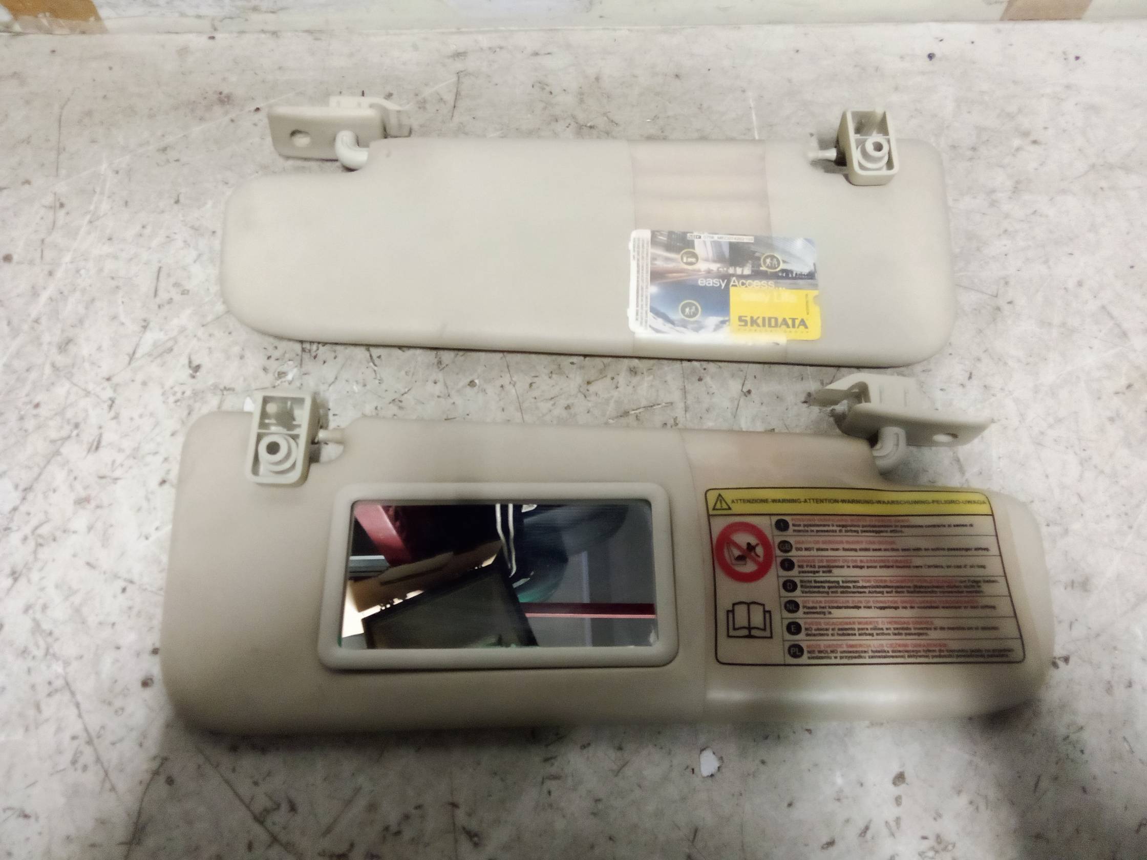 Aletta parasole parabrezza sx.