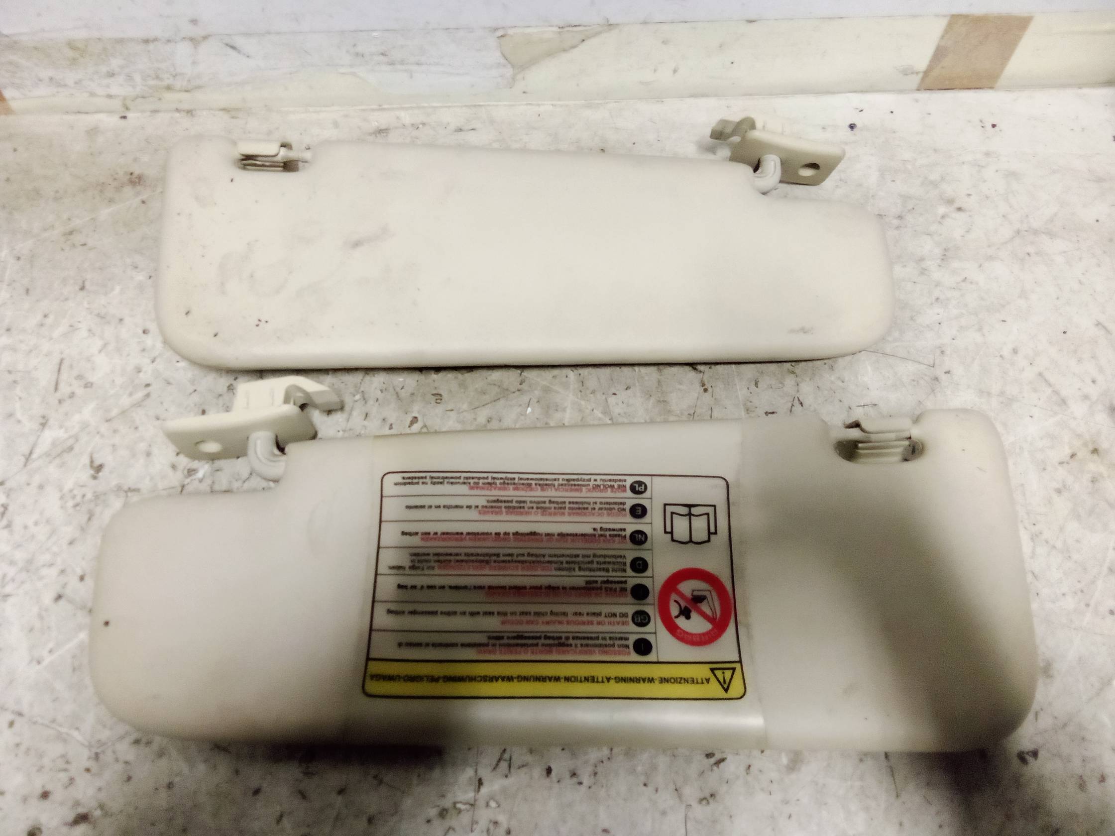 Aletta parasole parabrezza sx.