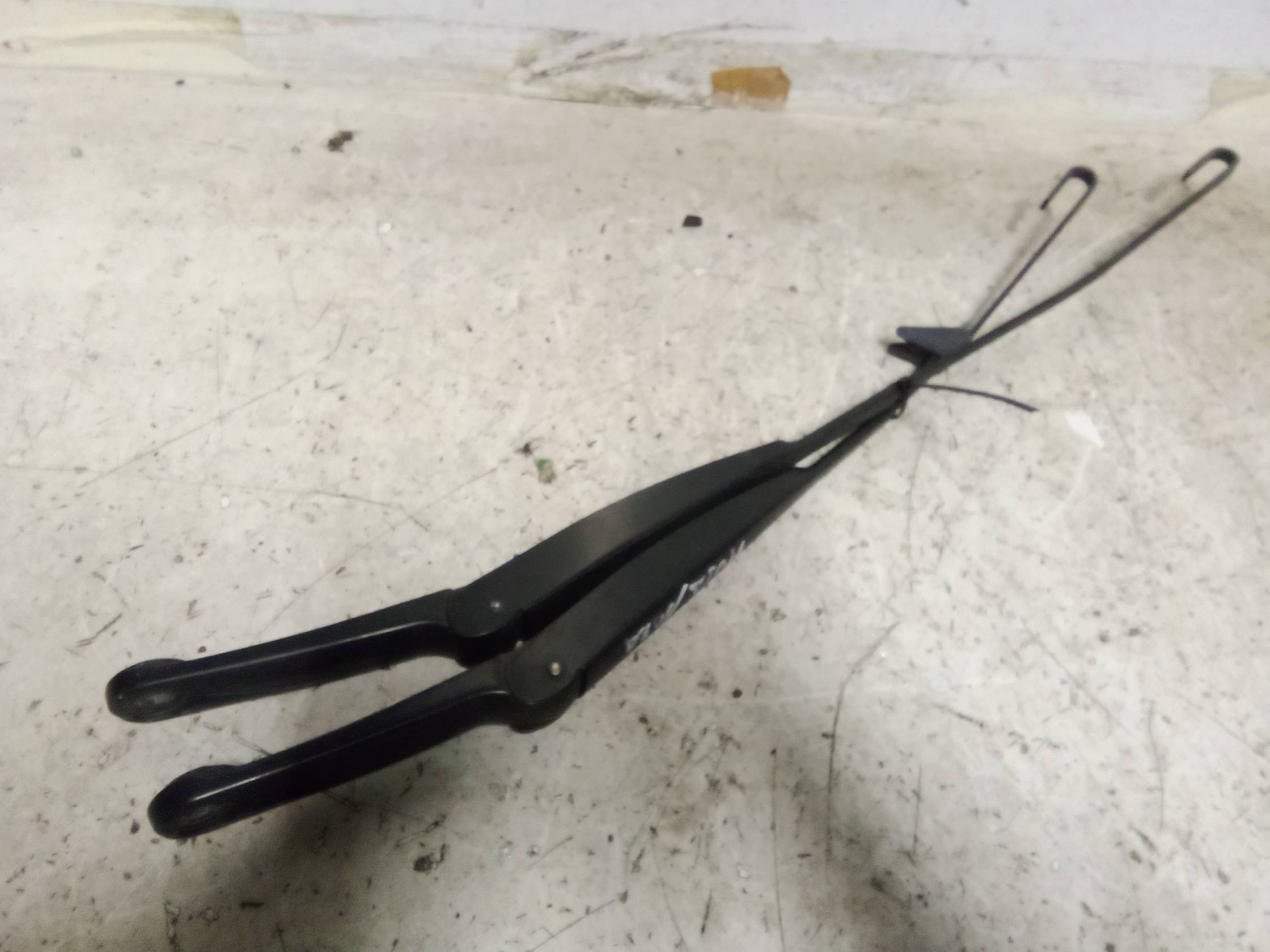 Braccio tergiparabrezza sx.