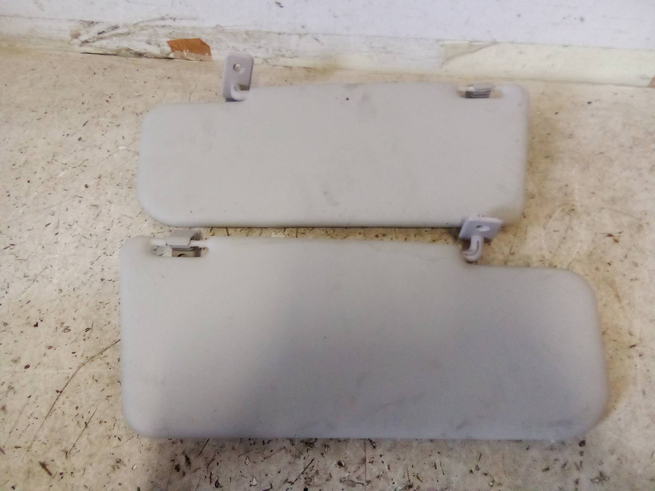 Aletta parasole parabrezza sx.