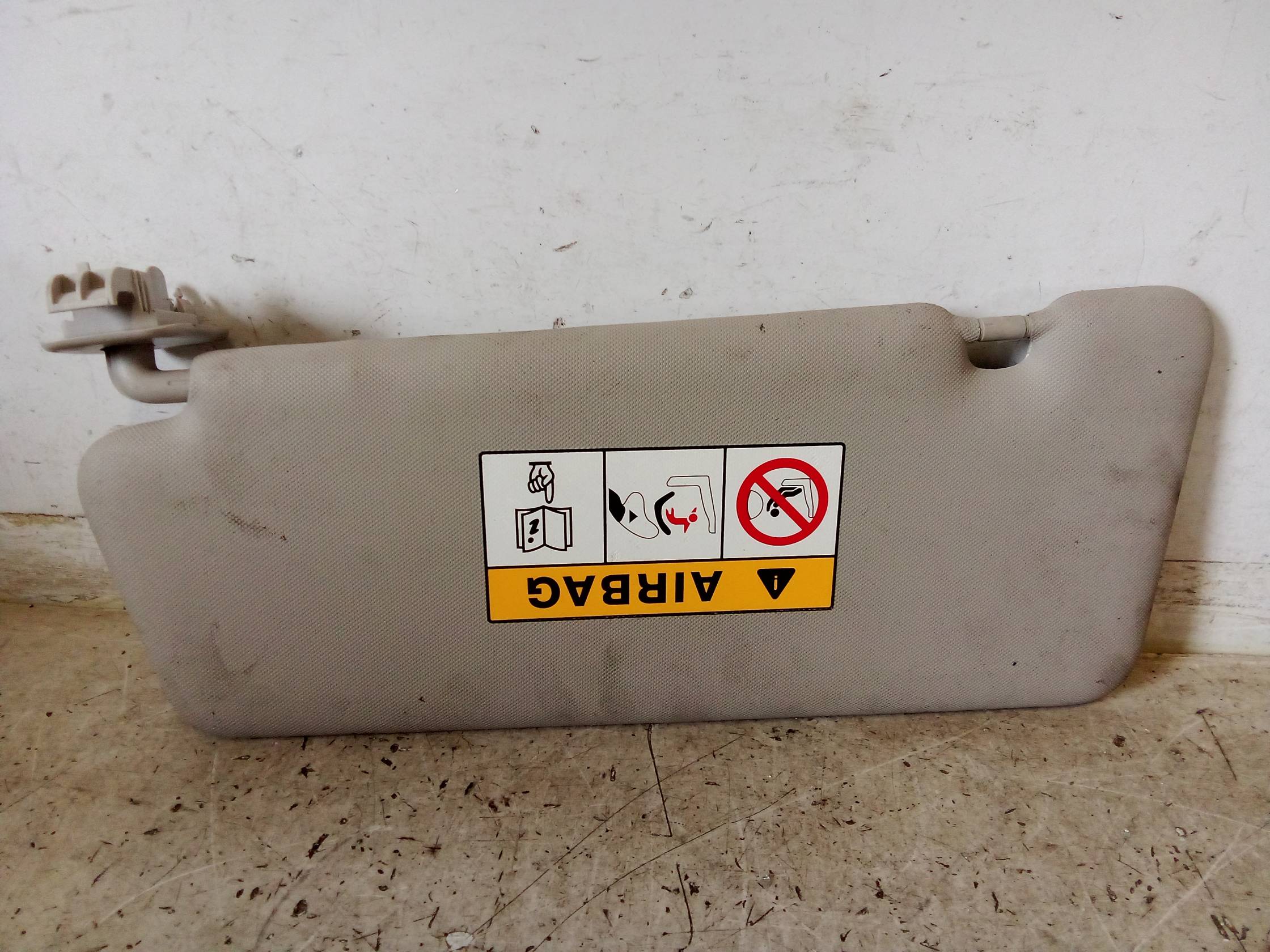 Aletta parasole parabrezza dx.