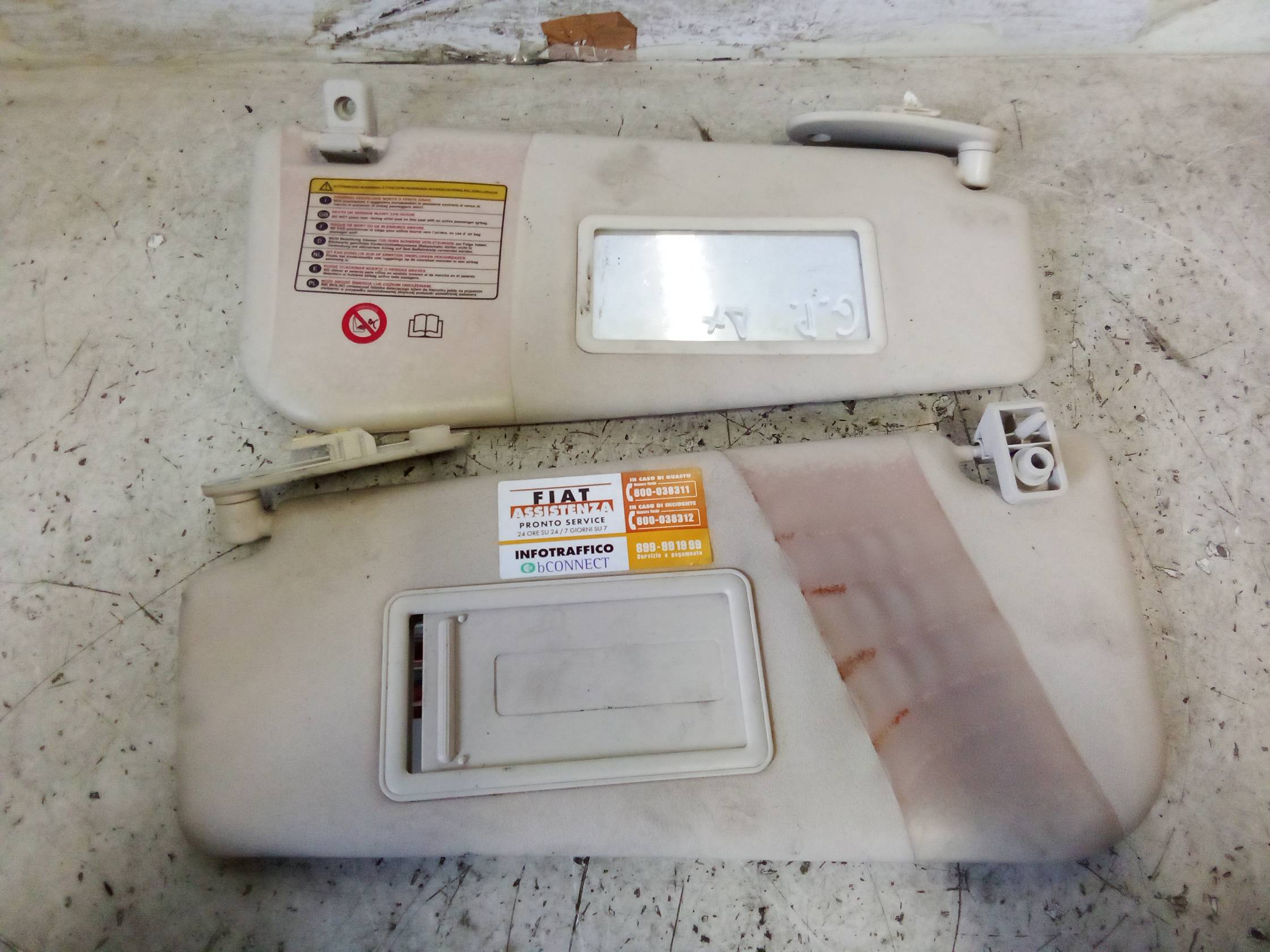 Aletta parasole parabrezza sx.