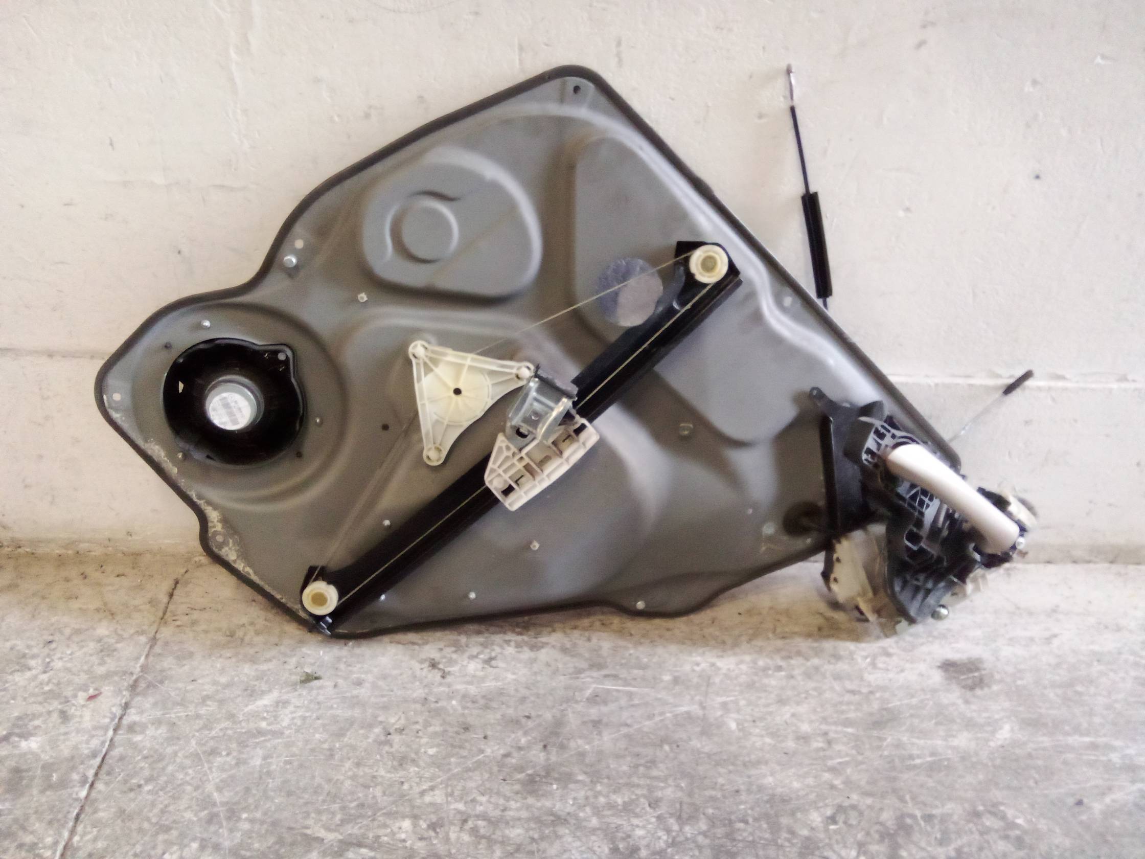 Alzacristallo elettr. porta post. sx.