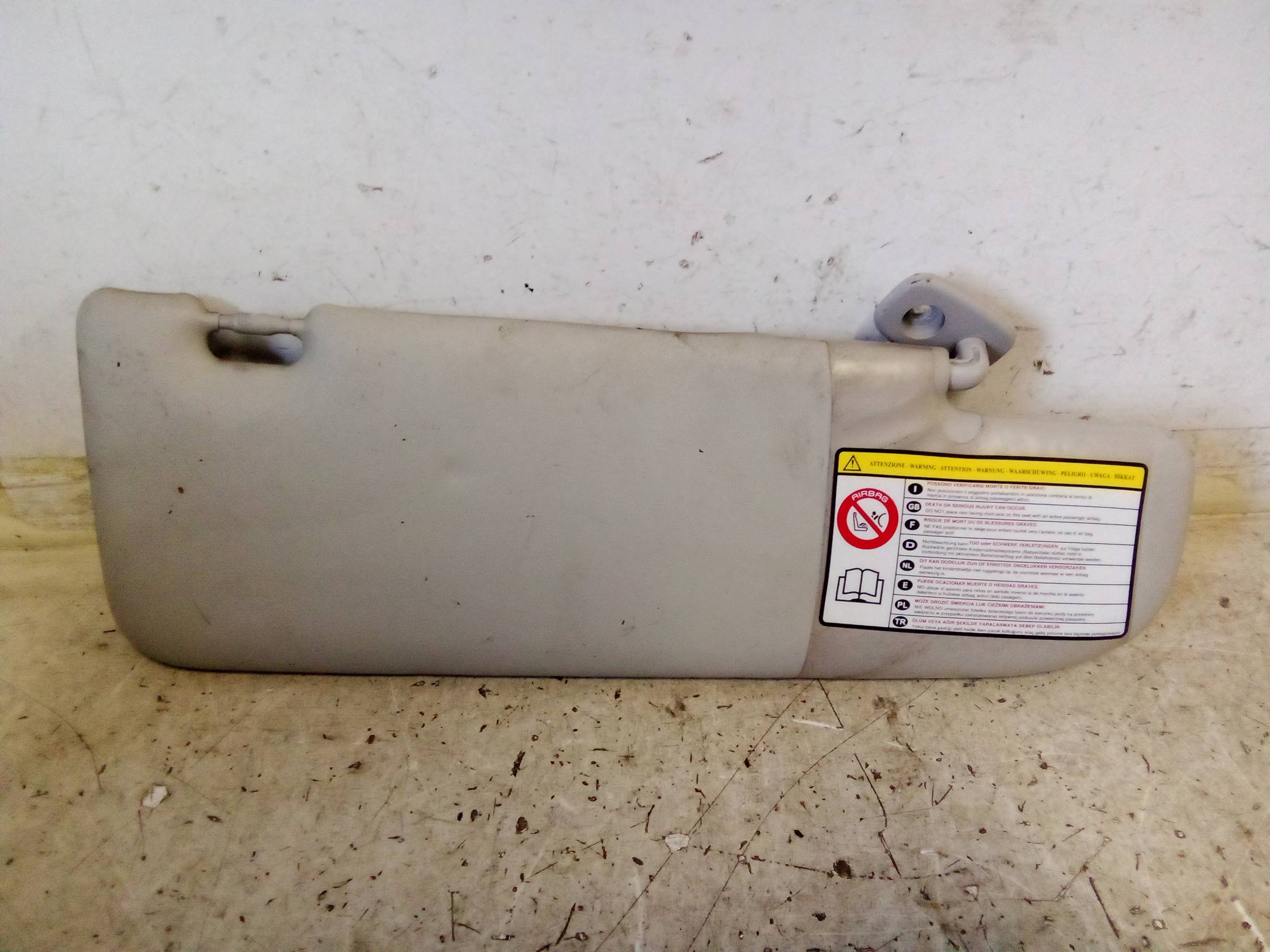 Aletta parasole parabrezza dx.