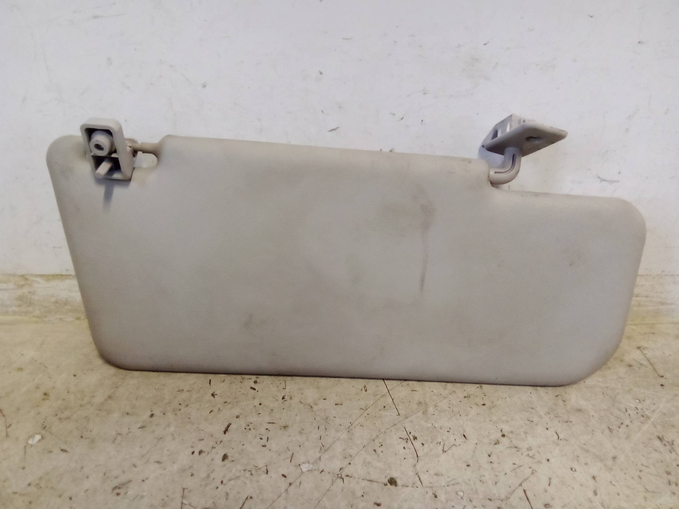 Aletta parasole parabrezza sx.