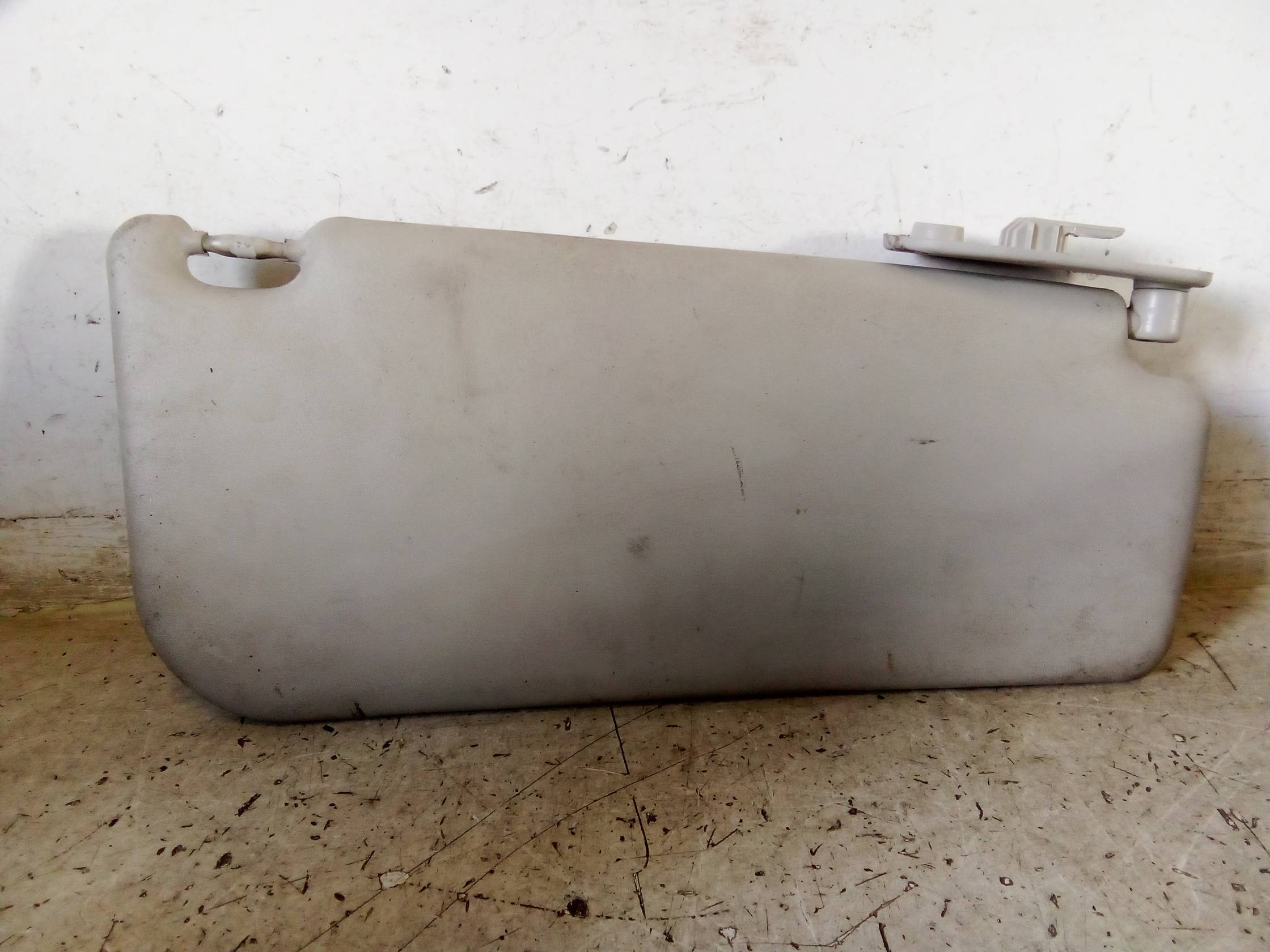 Aletta parasole parabrezza sx.