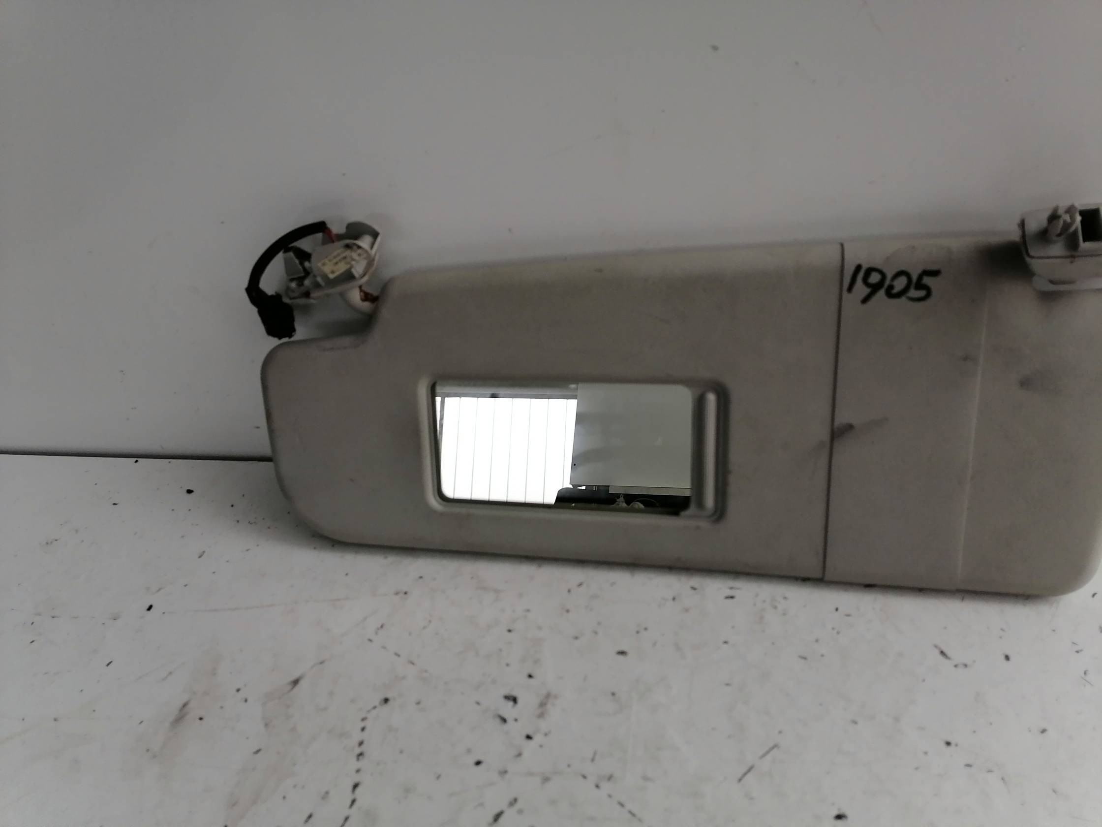 Aletta parasole parabrezza sx.