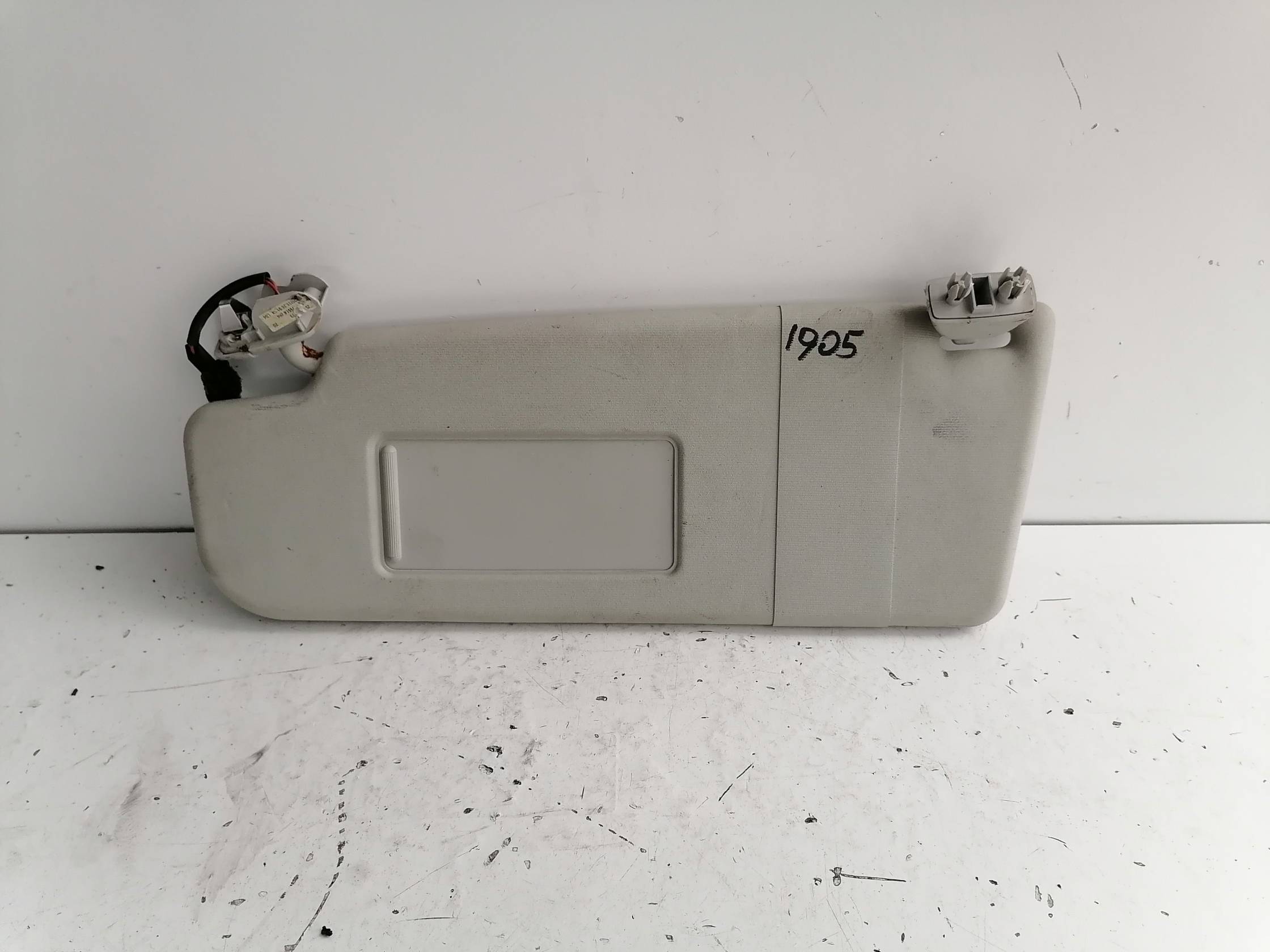 Aletta parasole parabrezza sx.