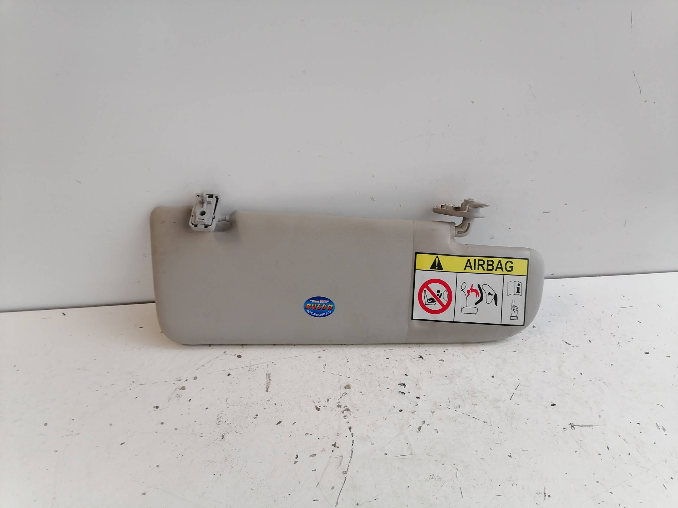 Aletta parasole parabrezza dx.