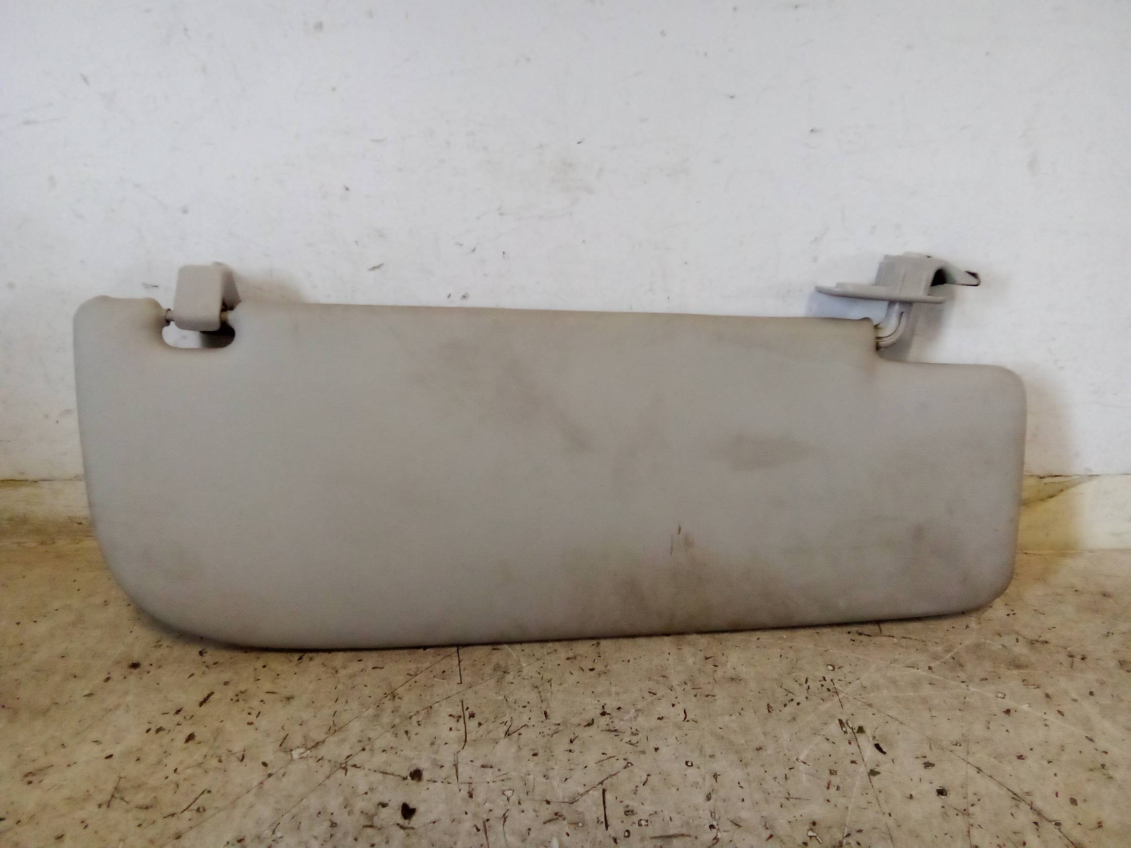 Aletta parasole parabrezza sx.