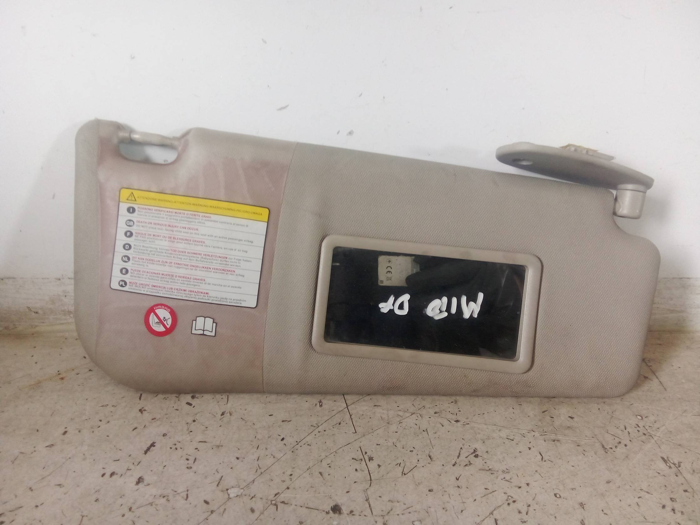 Aletta parasole parabrezza dx.