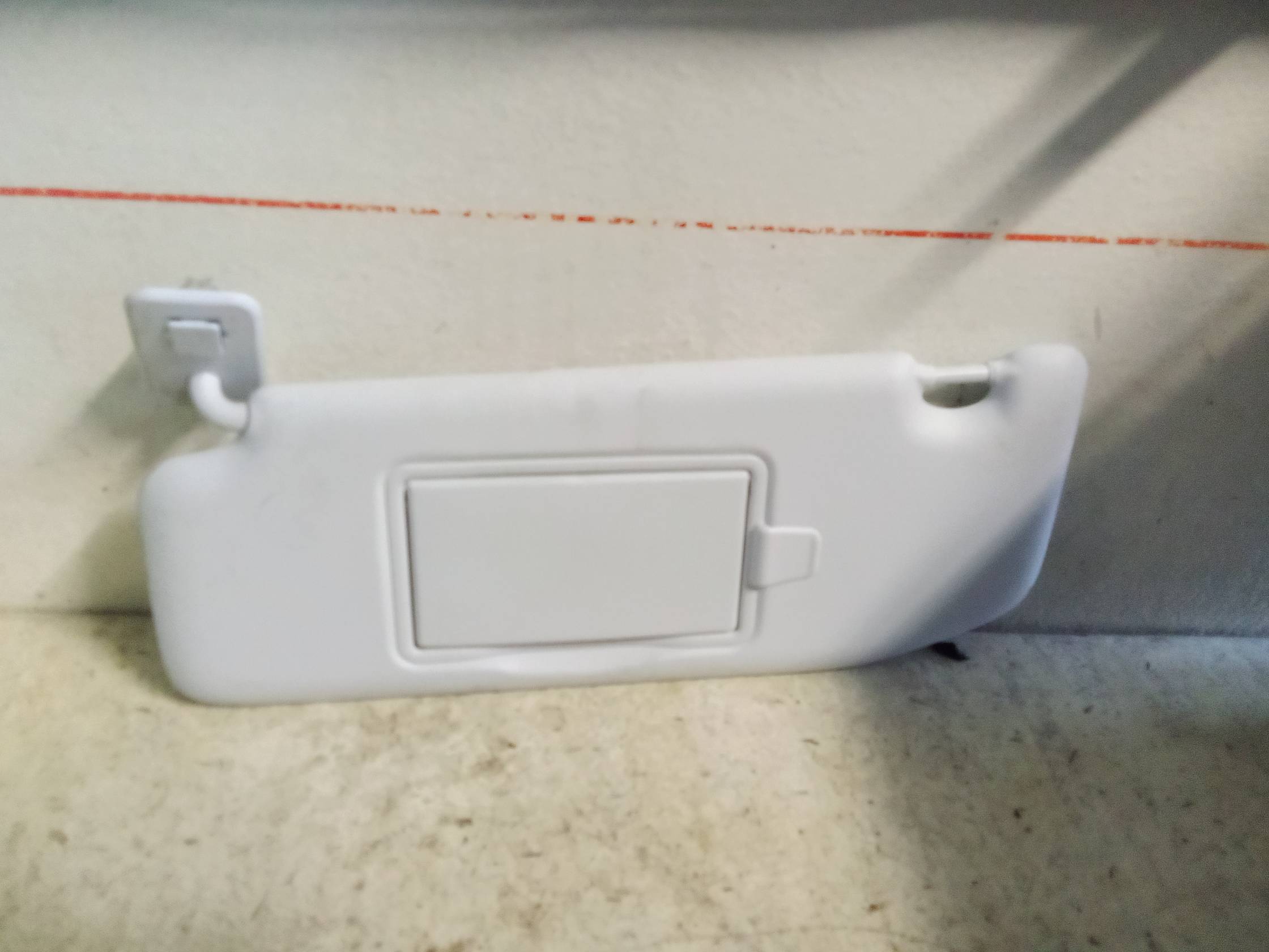 Aletta parasole parabrezza sx.