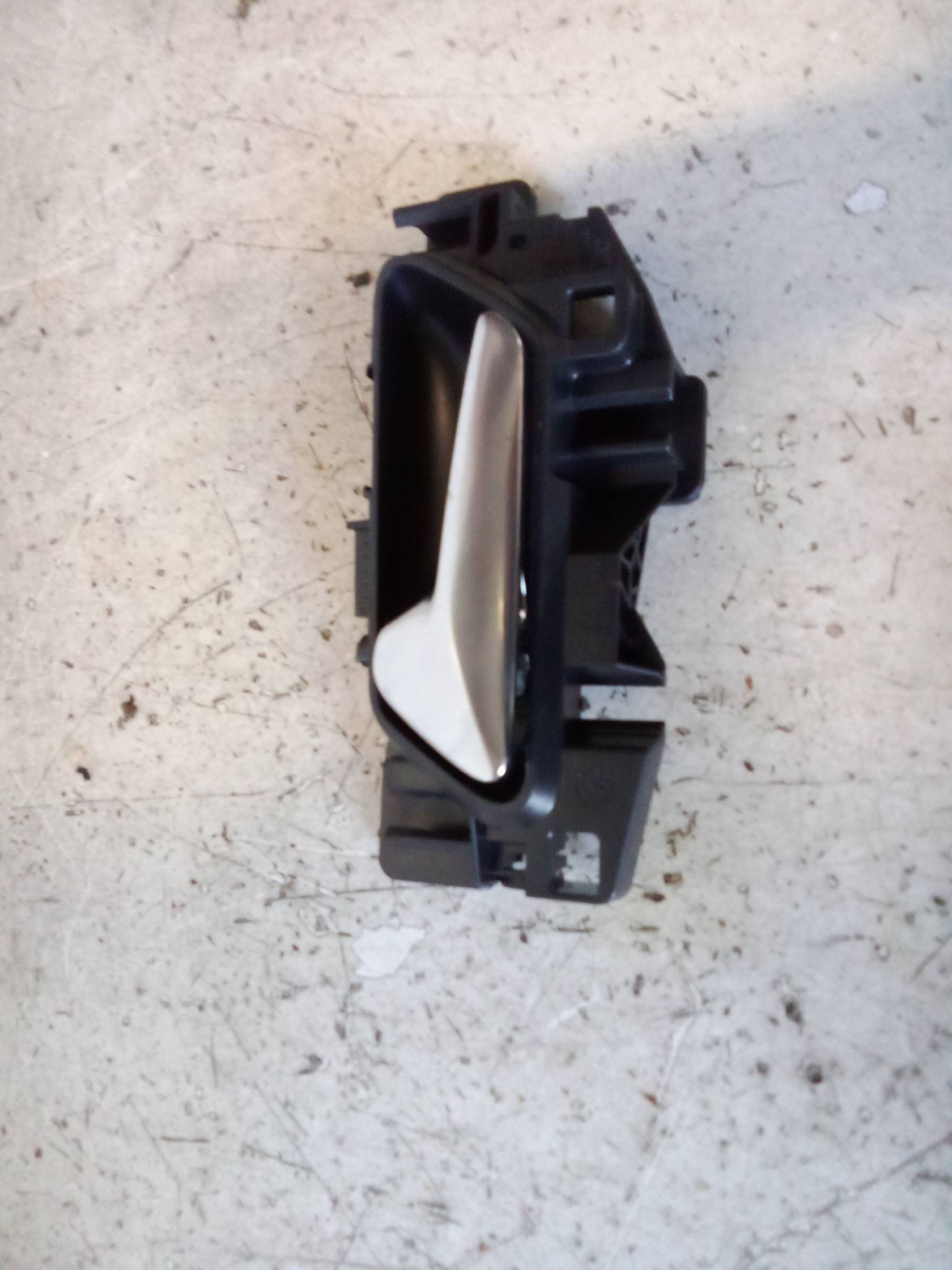 Maniglia int. apertura  porta ant. sx.