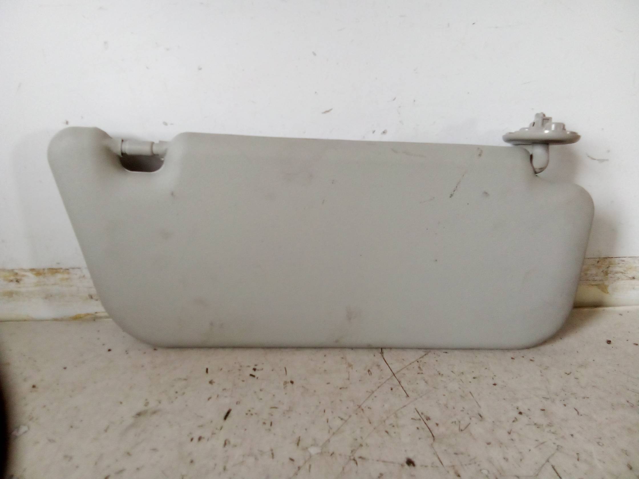 Aletta parasole parabrezza sx.