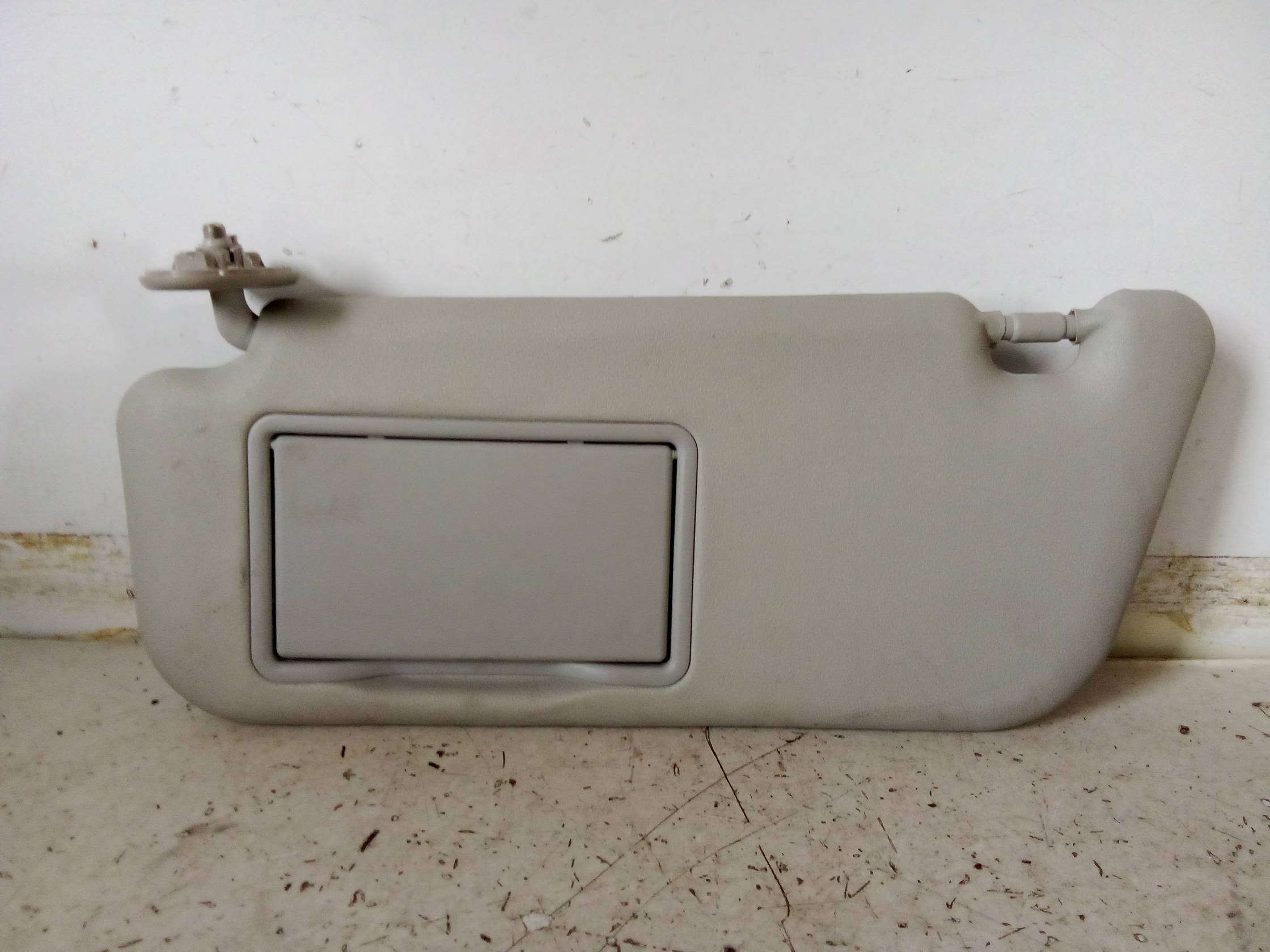 Aletta parasole parabrezza sx.