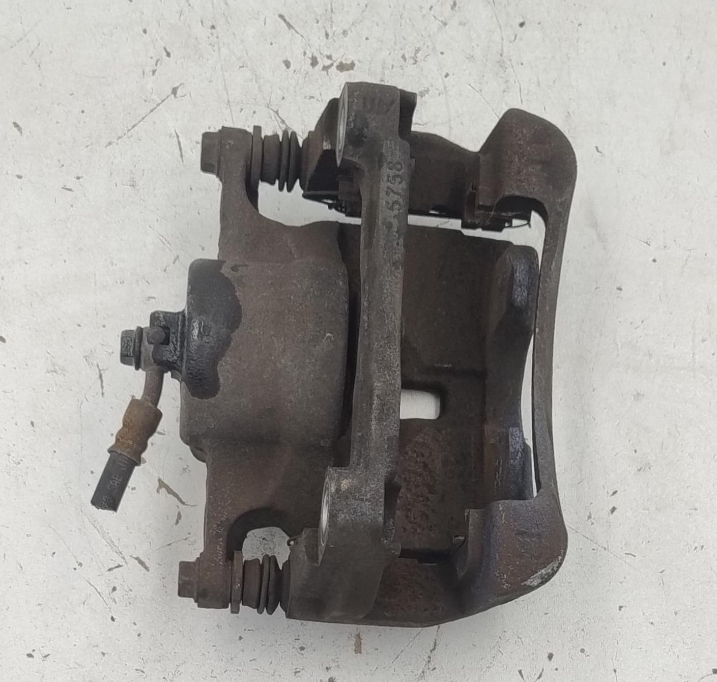 Pinza freno anteriore sx.