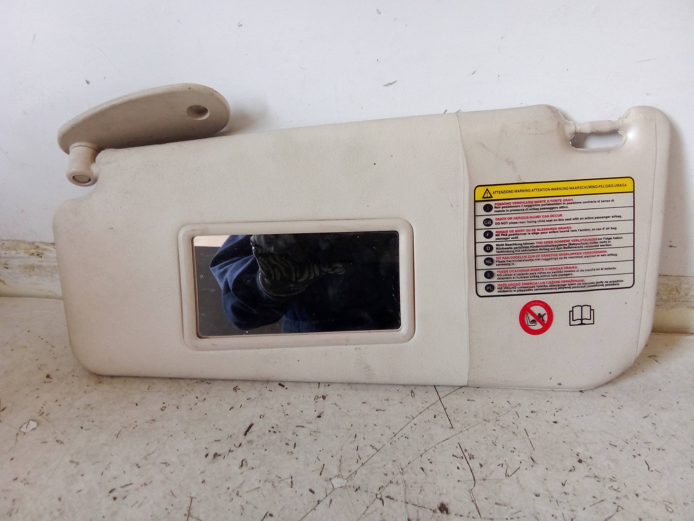 Aletta parasole parabrezza sx.