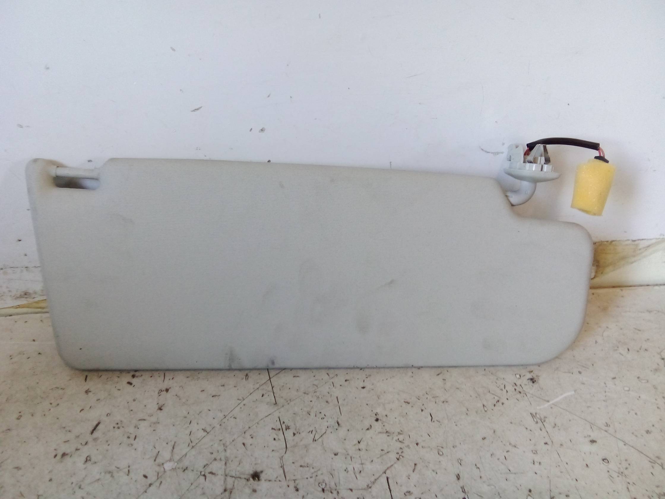 Aletta parasole parabrezza sx.