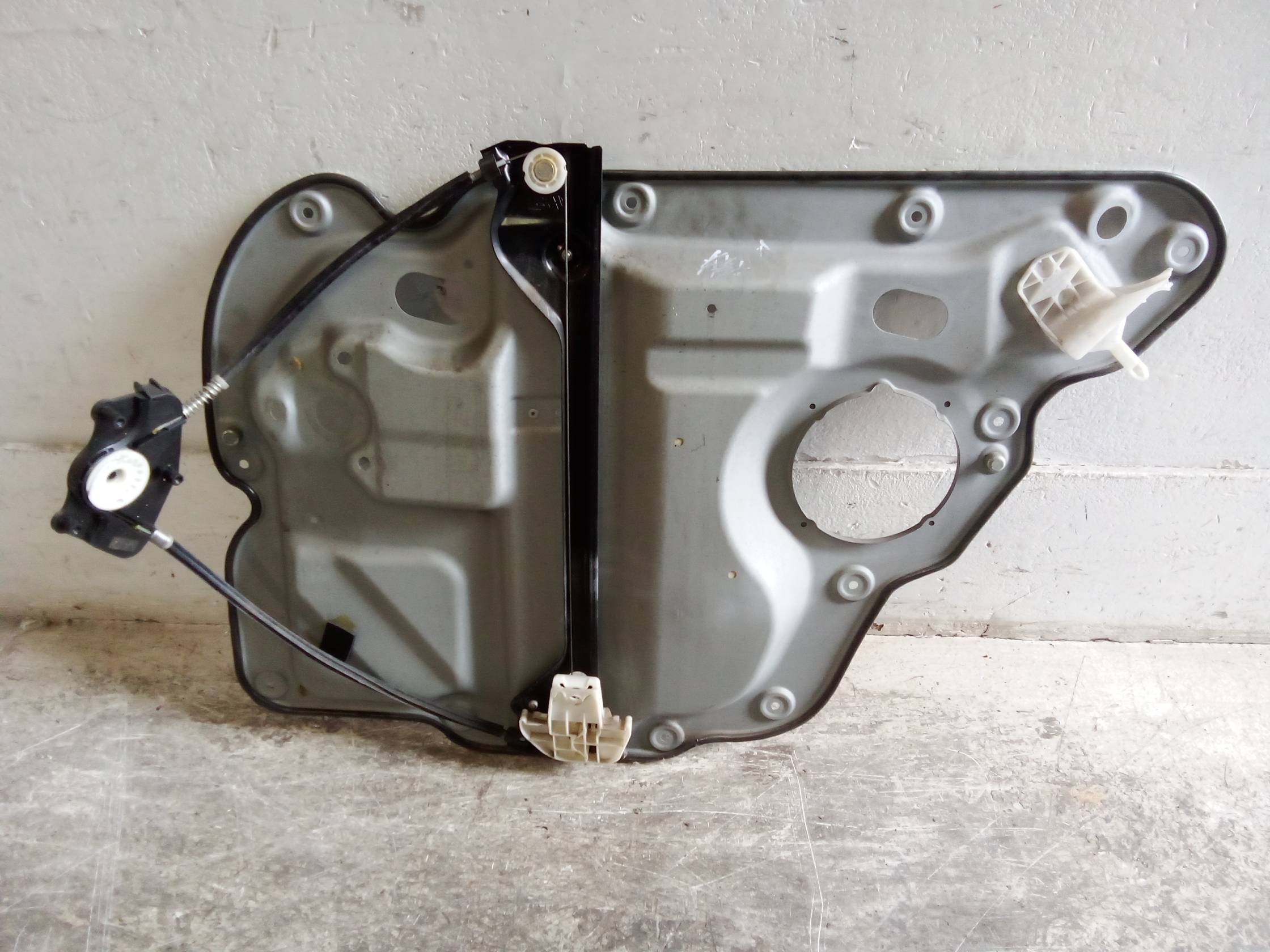 Alzacristallo elettr. porta post. sx.