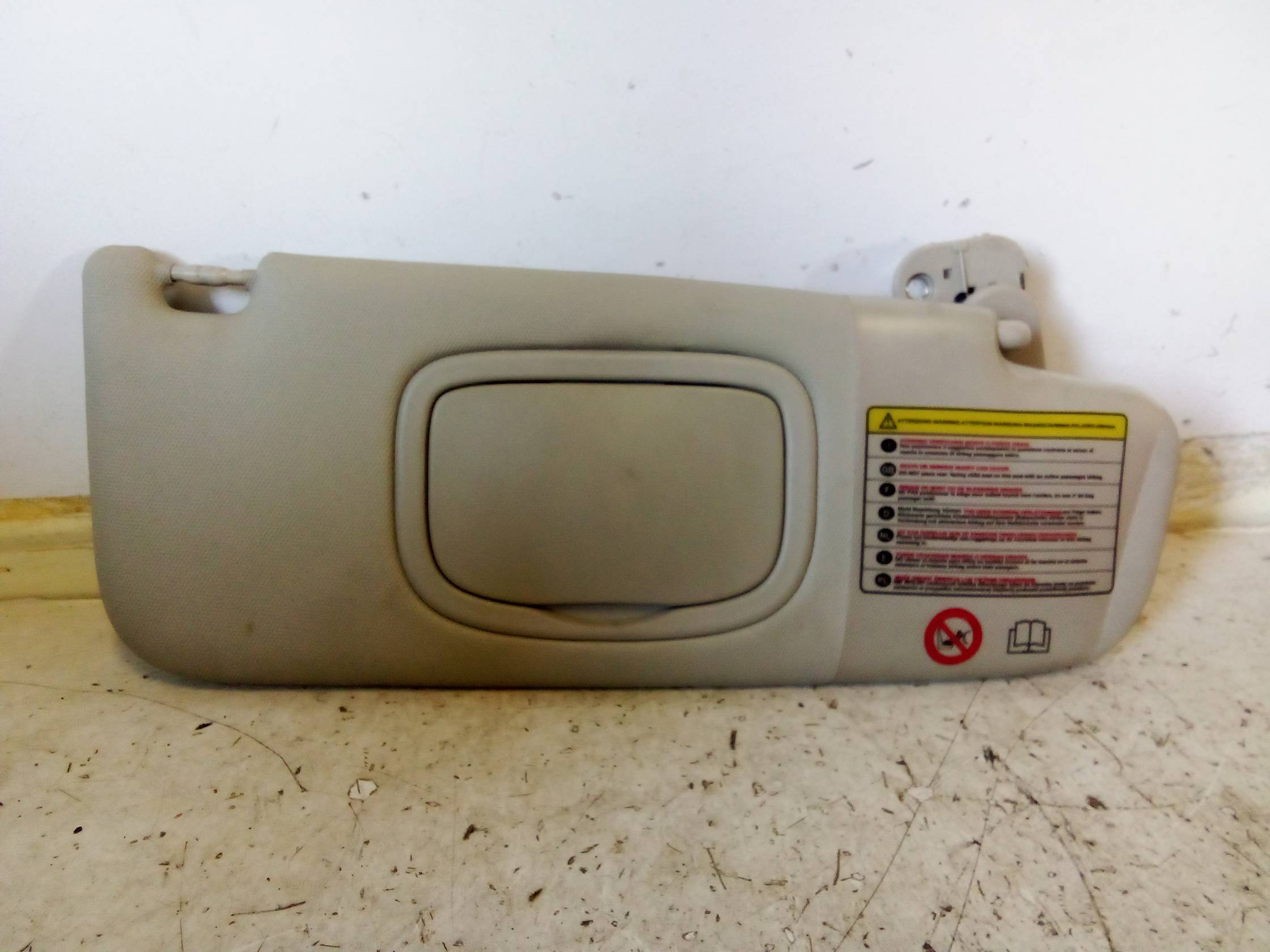 Aletta parasole parabrezza dx.