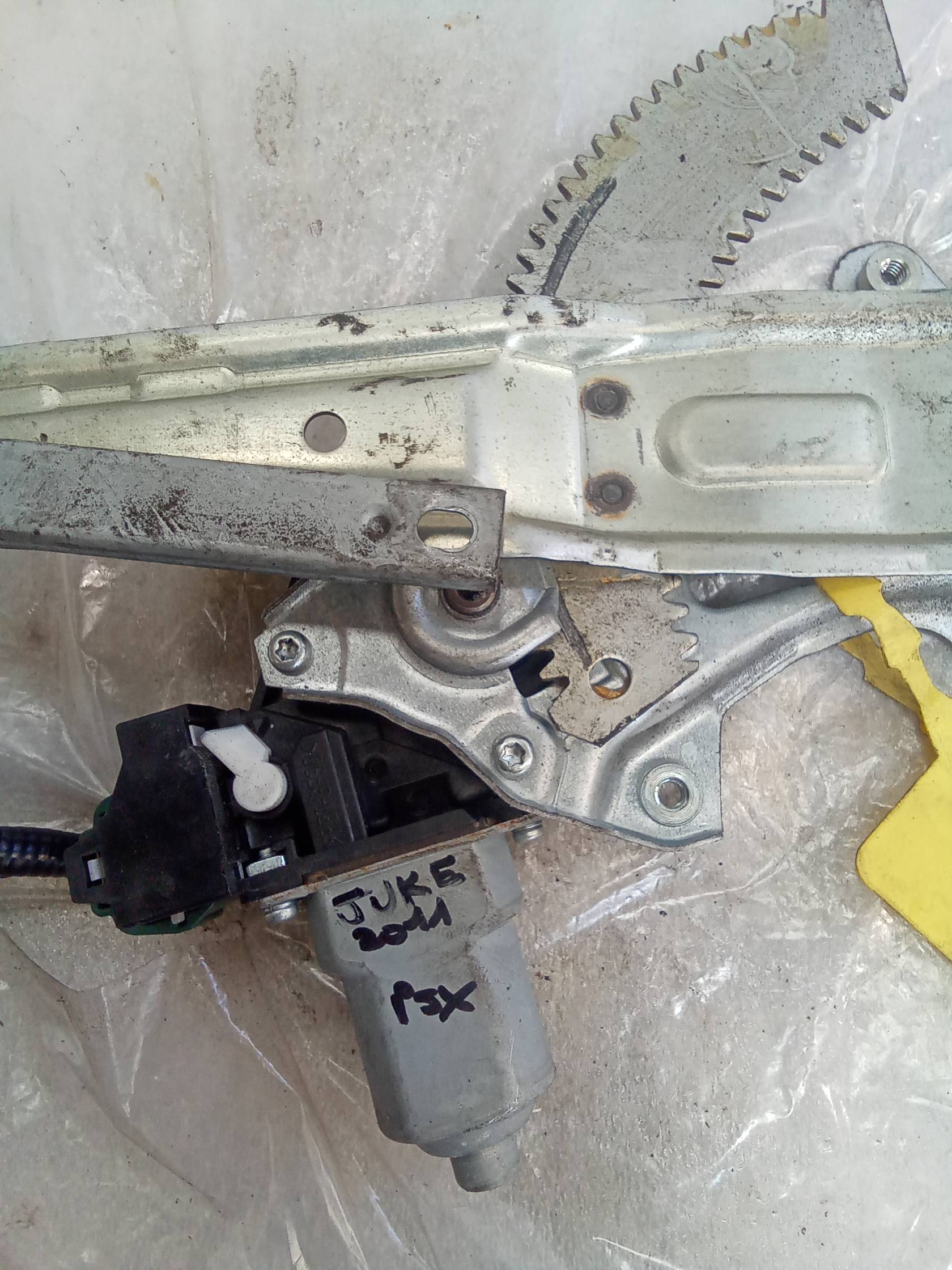 Alzacristallo elettr. porta post. sx.