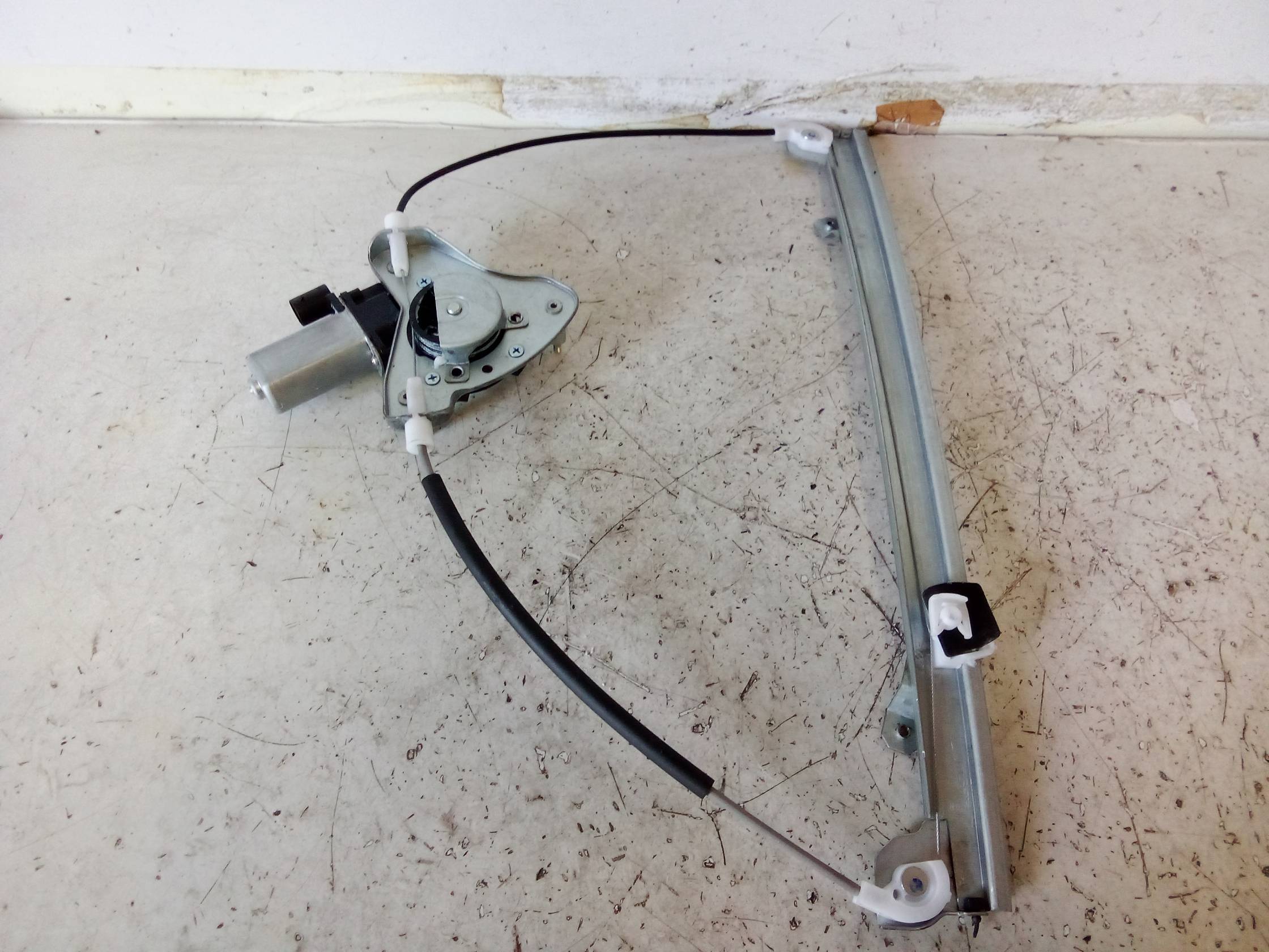 Alzacristallo elettr. porta ant. con motorino sx.