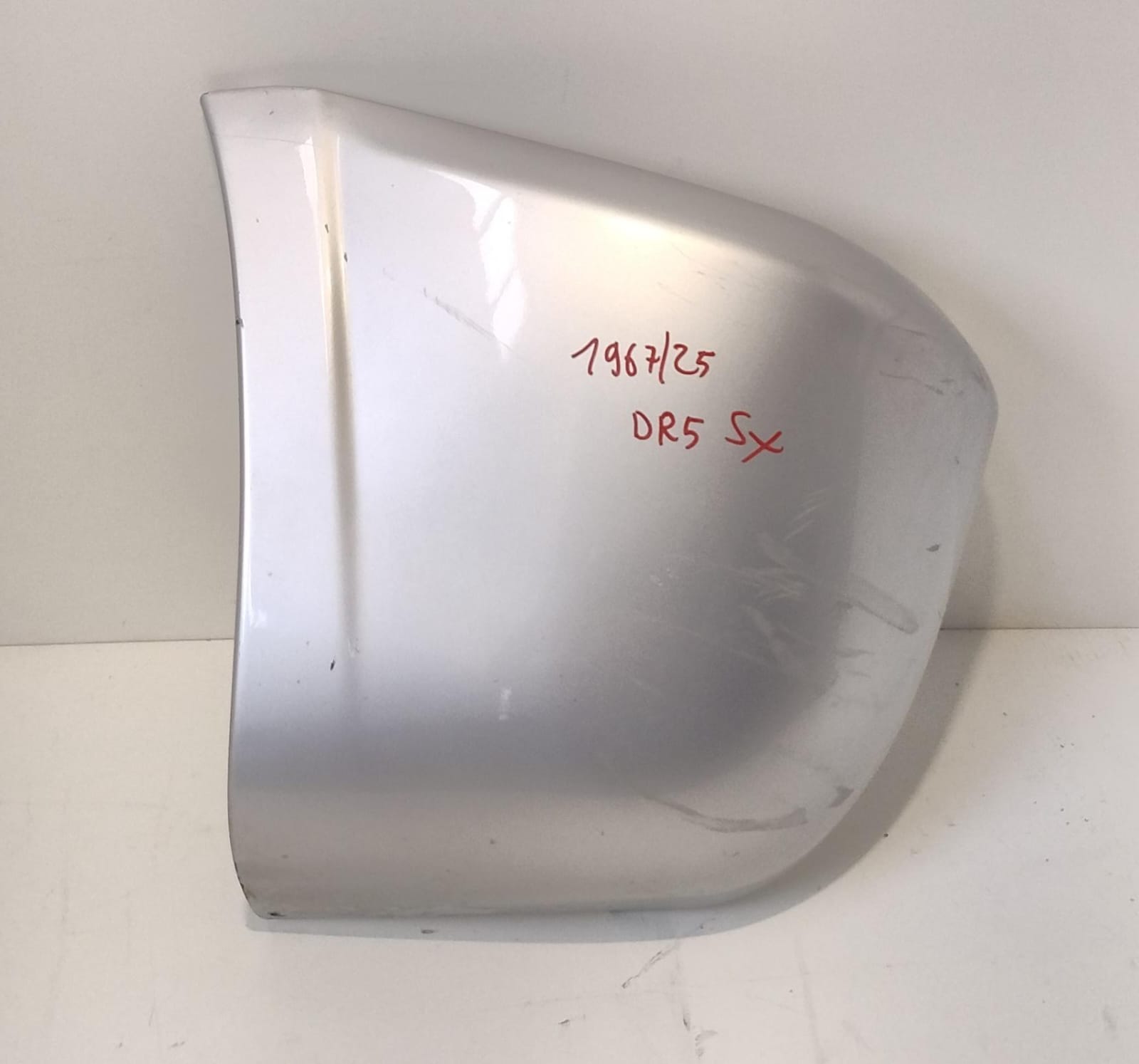 Paraurti post. lato sx.