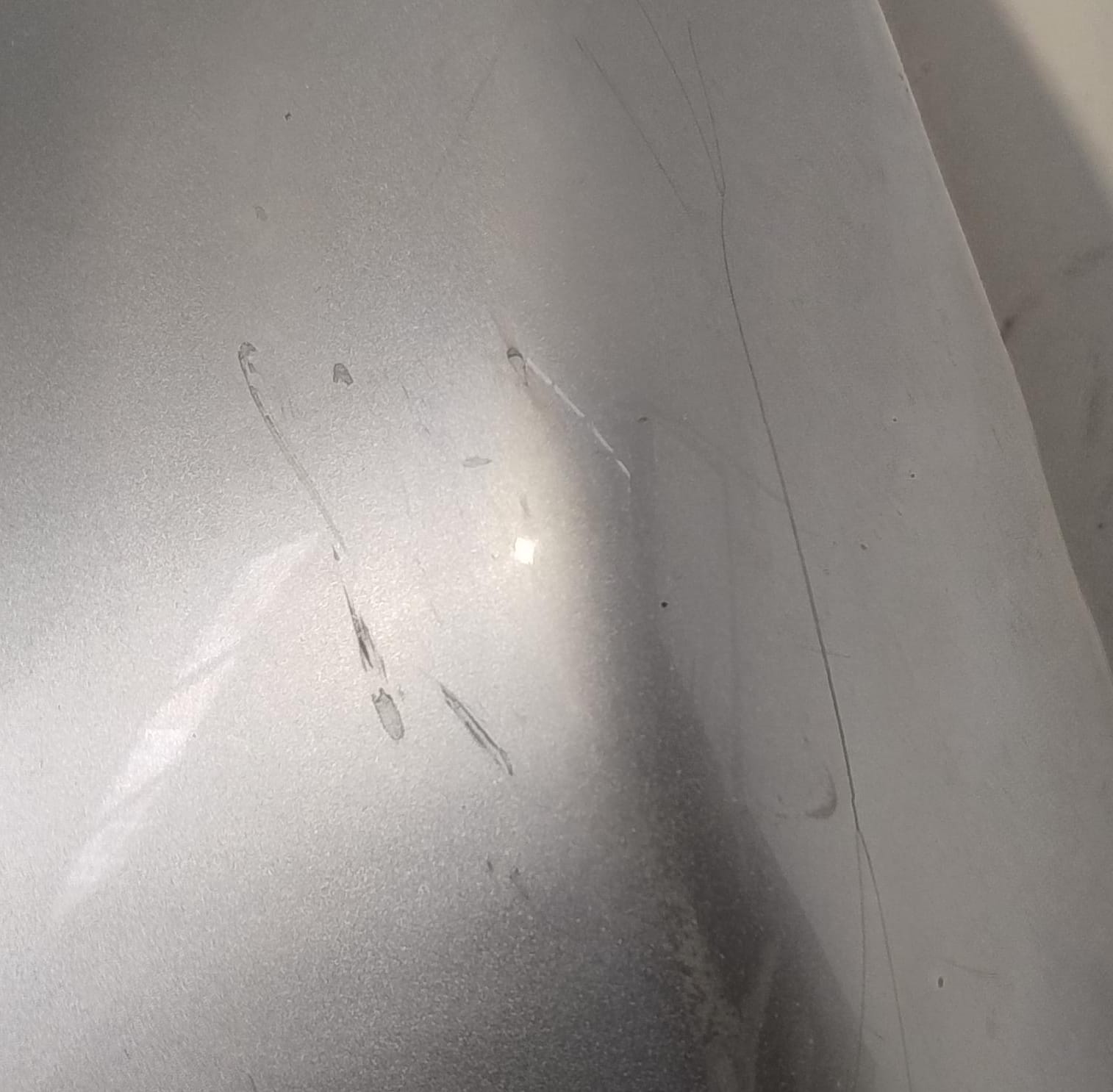 Paraurti post. lato sx.