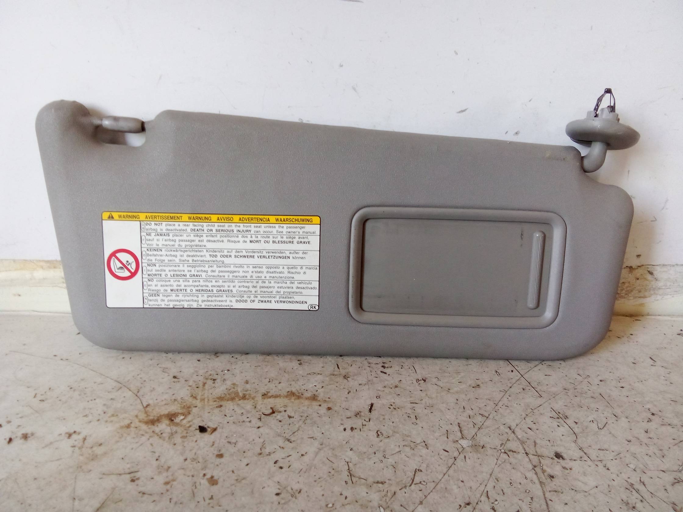 Aletta parasole parabrezza dx.